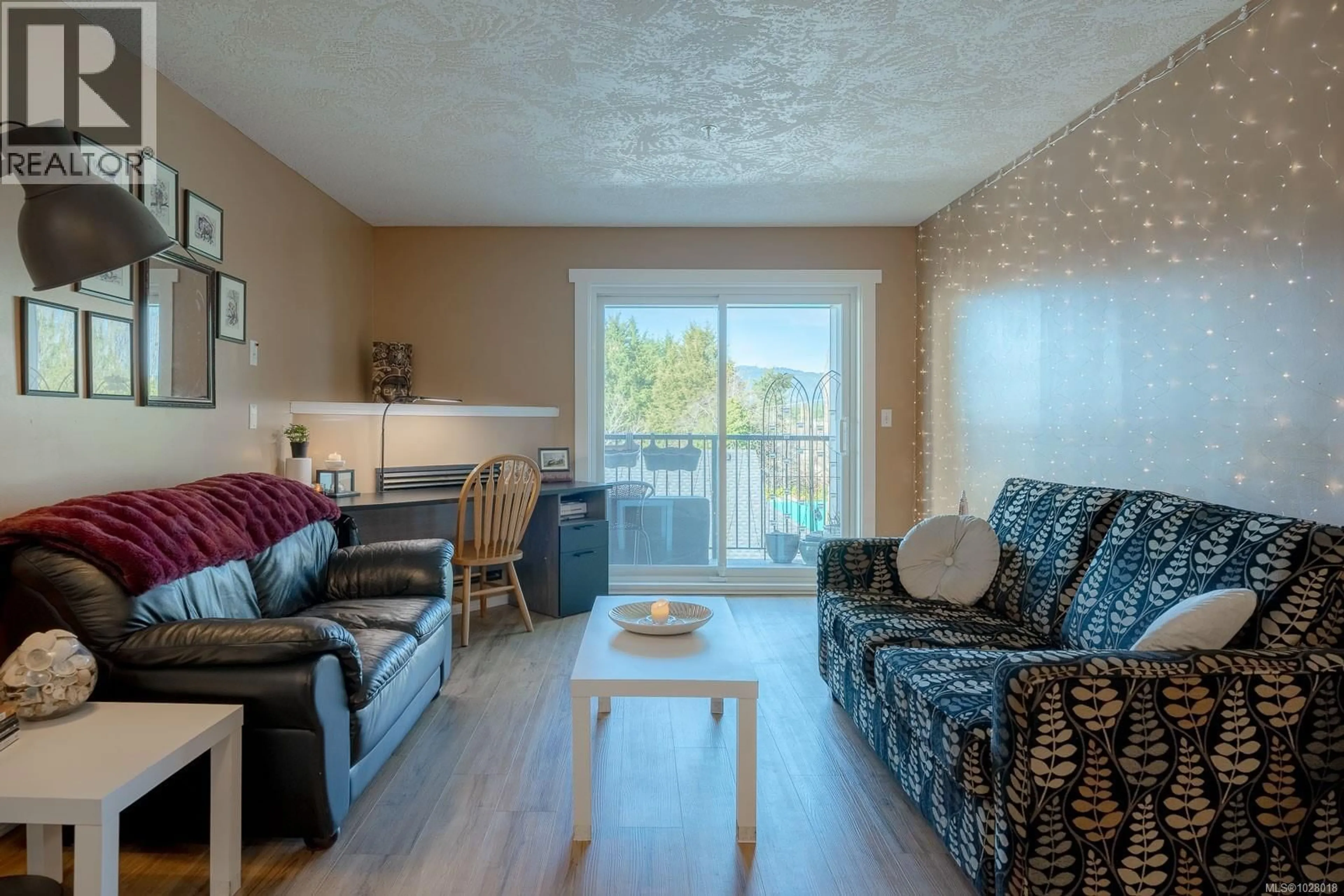 Living room with furniture, wood/laminate floor for 308 - 3855 11TH AVENUE, Port Alberni British Columbia V9Y4Z2