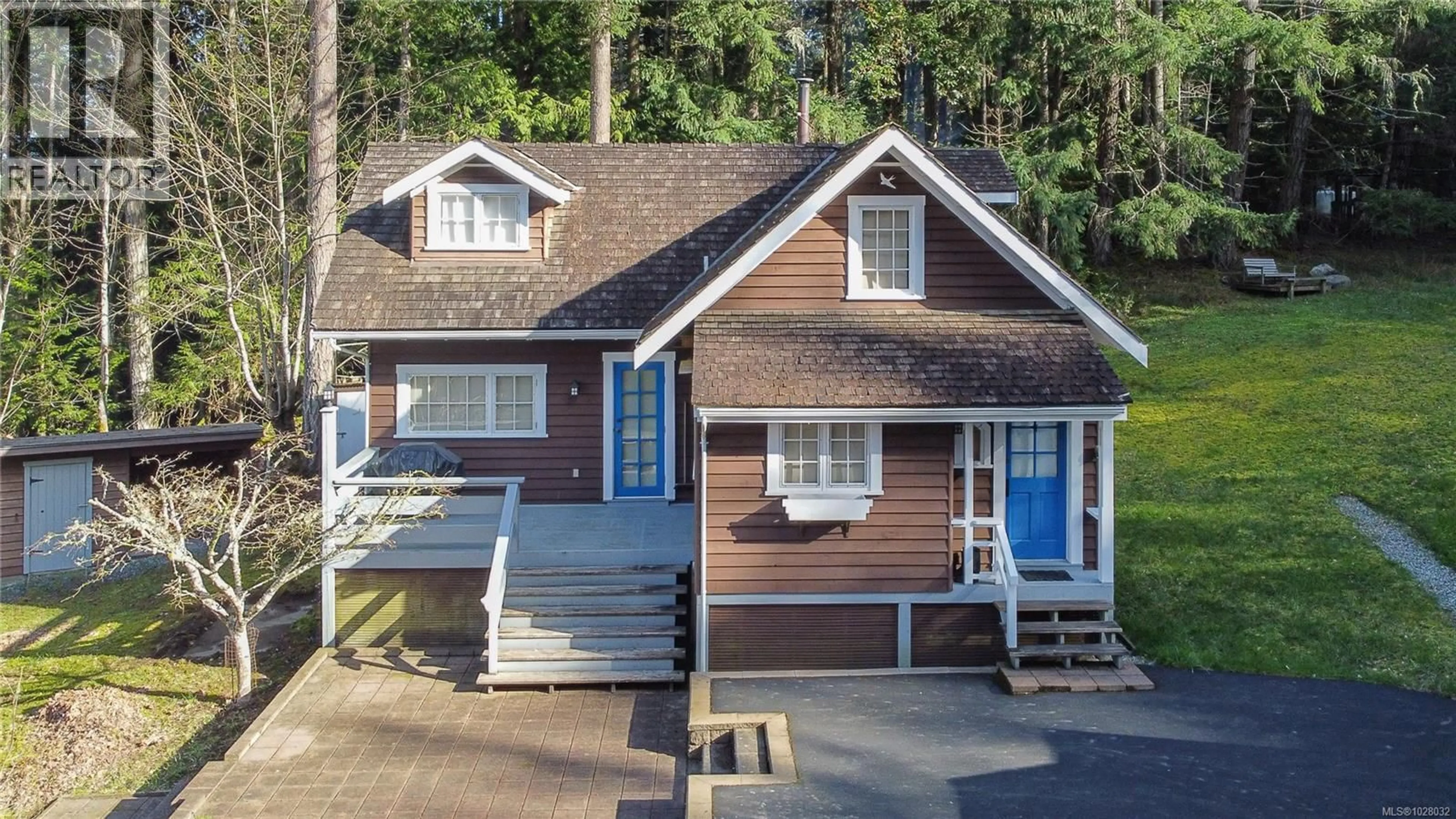 A pic from outside/outdoor area/front of a property/back of a property/a pic from drone, street for 696 RAINBOW ROAD, Salt Spring British Columbia V8K2M6