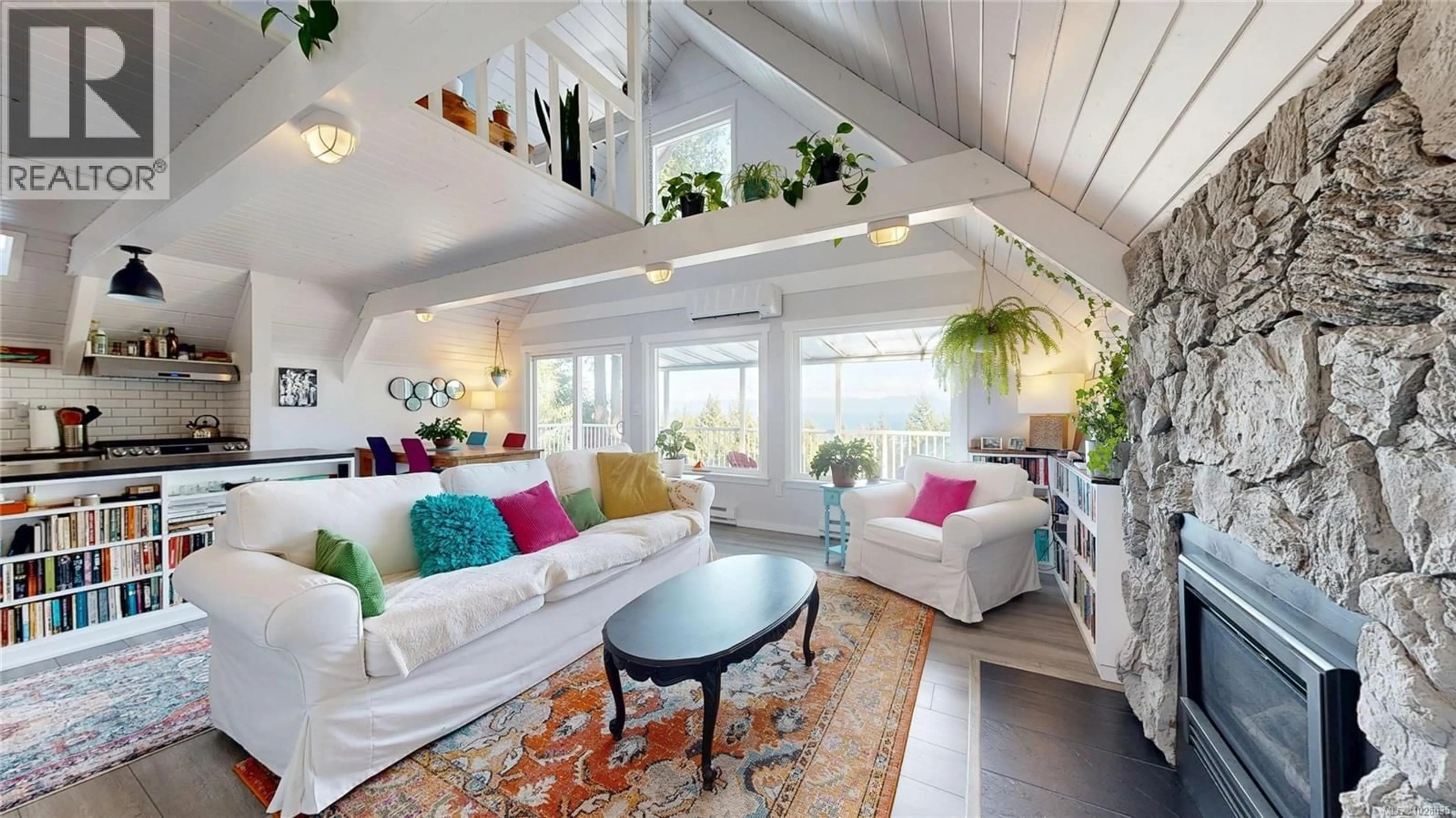 Living room with furniture, wood/laminate floor for 1520 WILD CHERRY TERRACE, Gabriola Island British Columbia V0R1X5