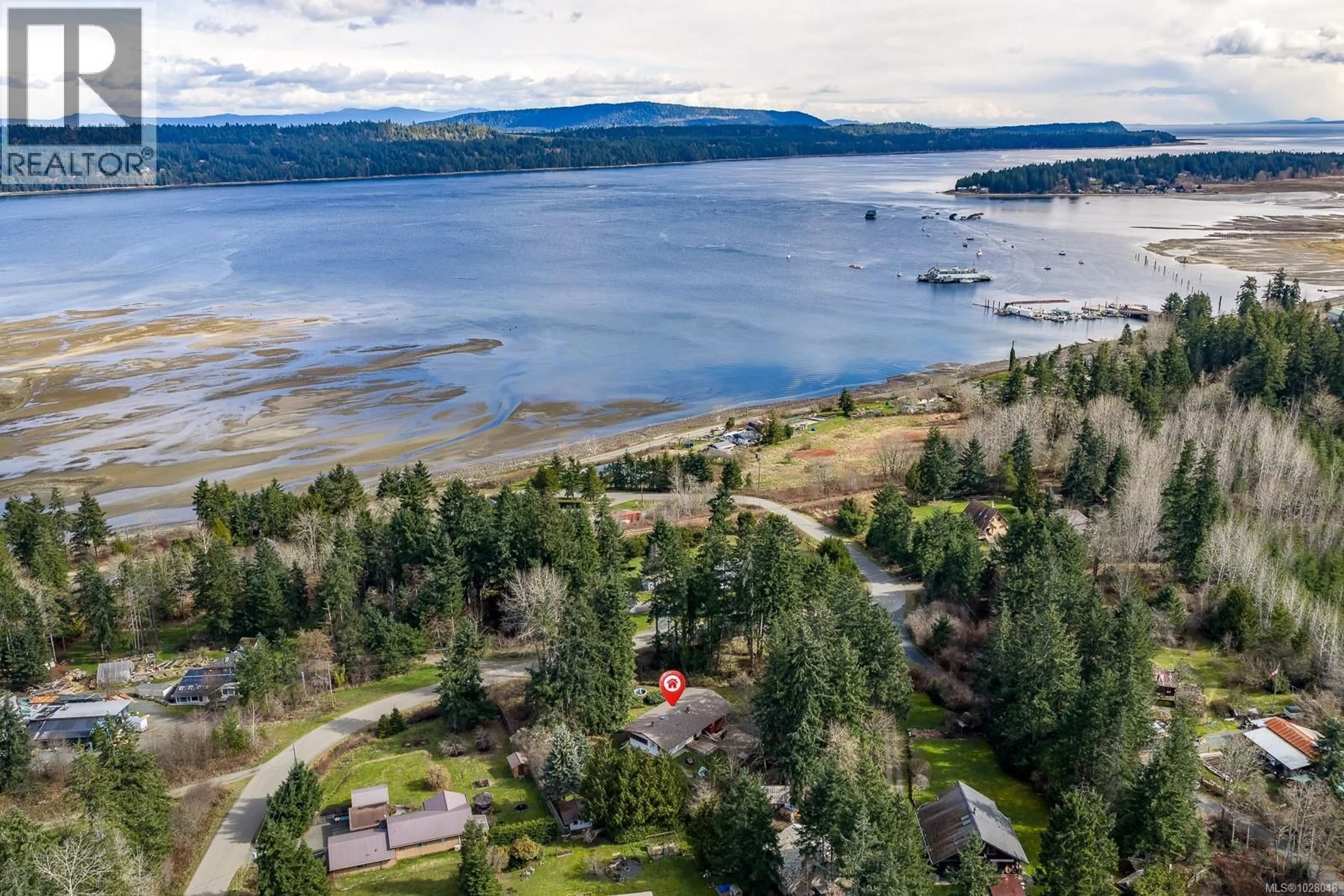 A pic from outside/outdoor area/front of a property/back of a property/a pic from drone, water/lake/river/ocean view for 415 HOLIDAY ROAD, Fanny Bay British Columbia V0R1W0