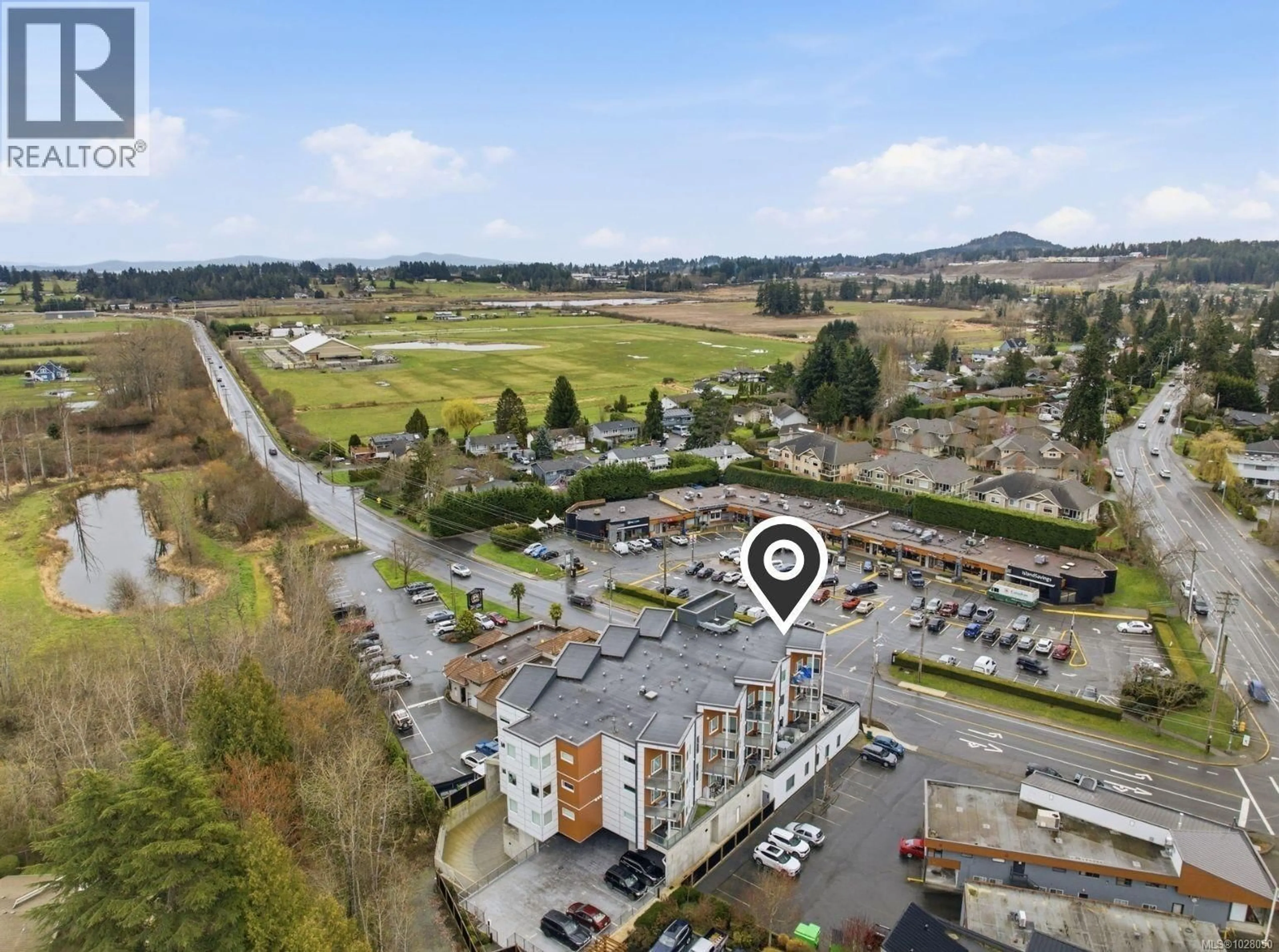A pic from outside/outdoor area/front of a property/back of a property/a pic from drone, mountain view for 301 - 7098 WALLACE DRIVE, Central Saanich British Columbia V8M1E9