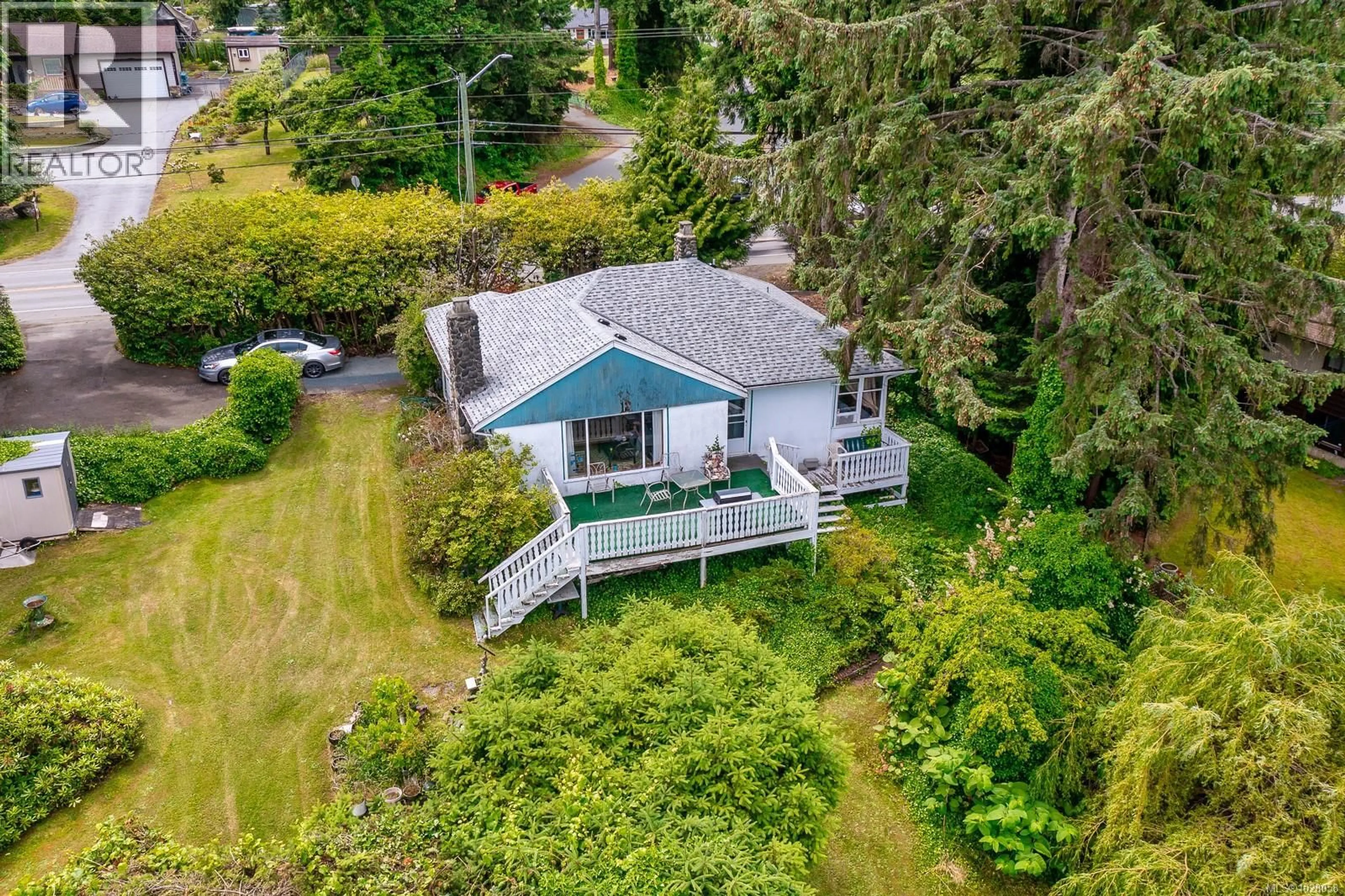 A pic from outside/outdoor area/front of a property/back of a property/a pic from drone, water/lake/river/ocean view for 3508 ISLAND HIGHWAY SOUTH, Courtenay British Columbia V9N9T9
