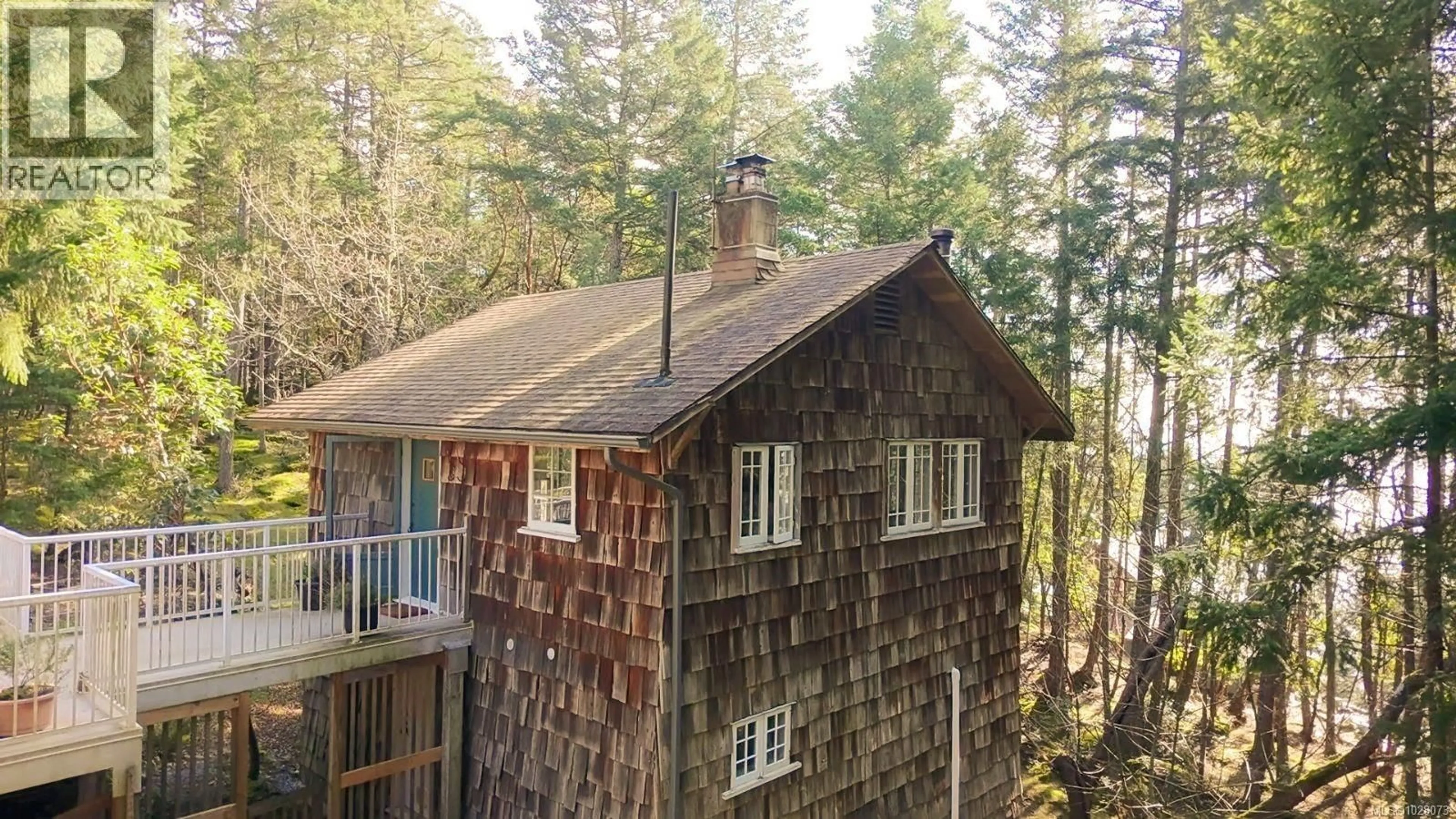 A pic from outside/outdoor area/front of a property/back of a property/a pic from drone, forest/trees view for 415 HALIBUT HILL ROAD, Mudge Island British Columbia V0R1X0