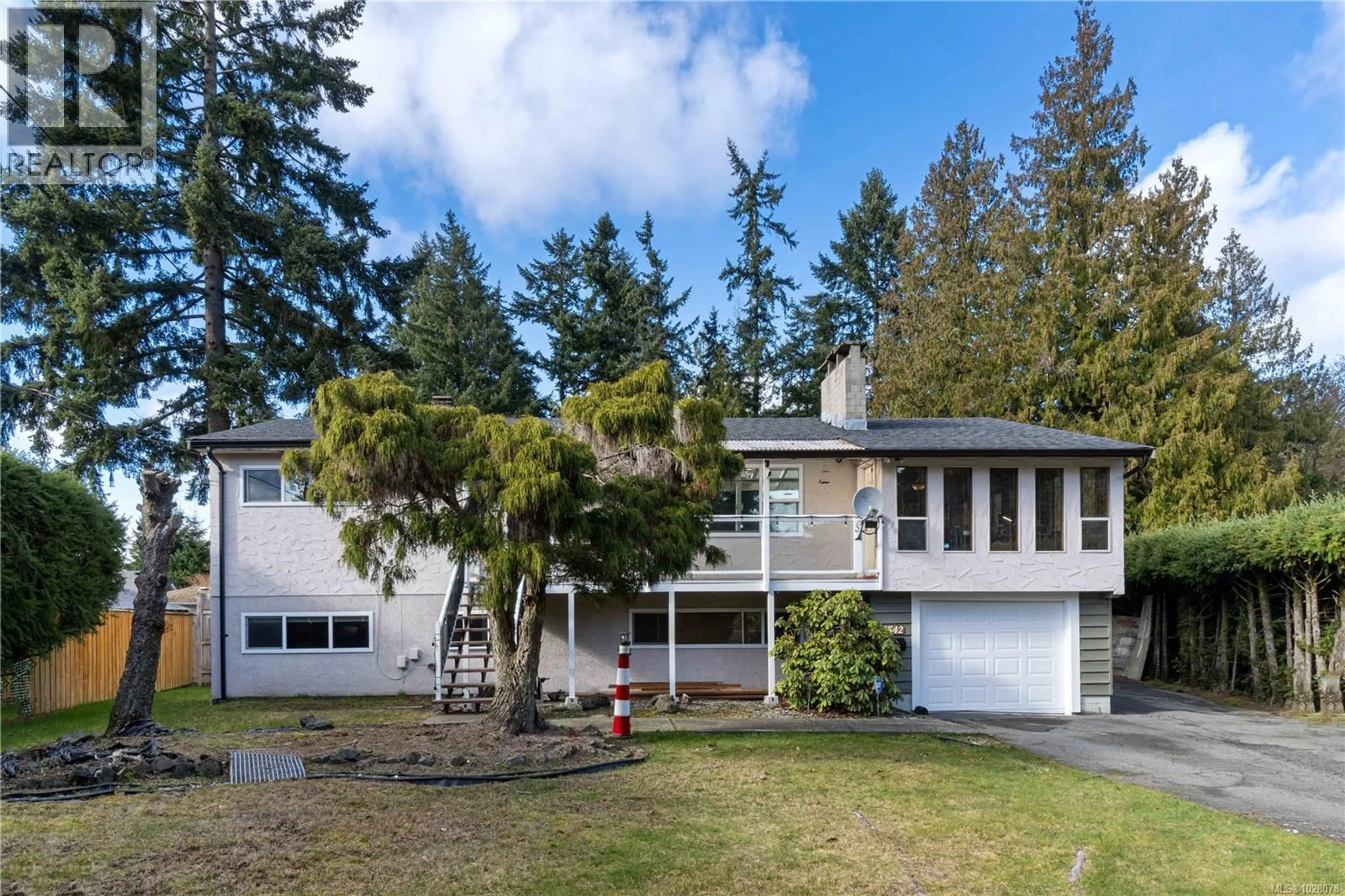 A pic from outside/outdoor area/front of a property/back of a property/a pic from drone, street for 5542 TULIP PLACE, Nanaimo British Columbia V9T2N2