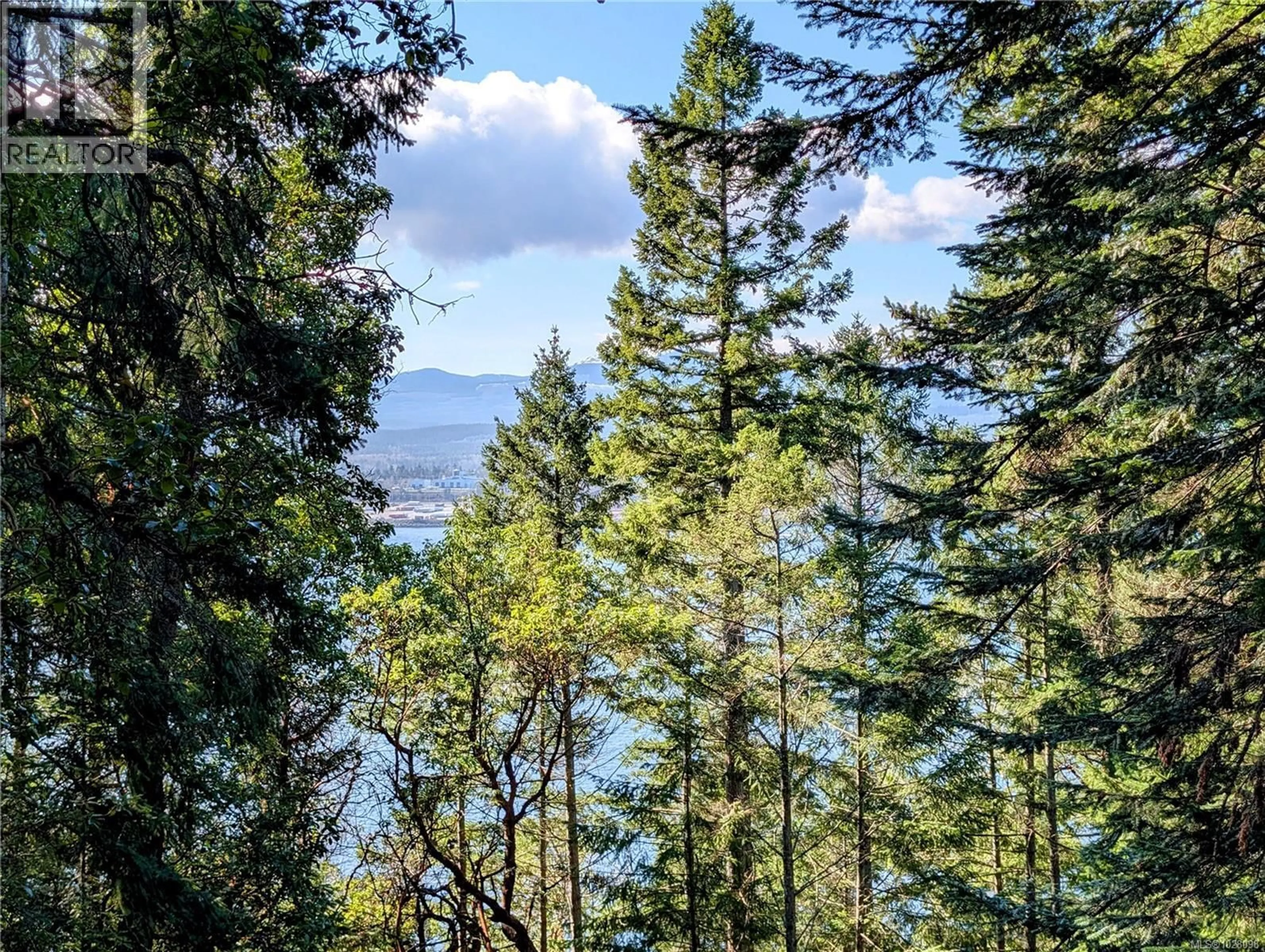 A pic from outside/outdoor area/front of a property/back of a property/a pic from drone, forest/trees view for 1374 HARRISON WAY, Gabriola Island British Columbia V0R1X2