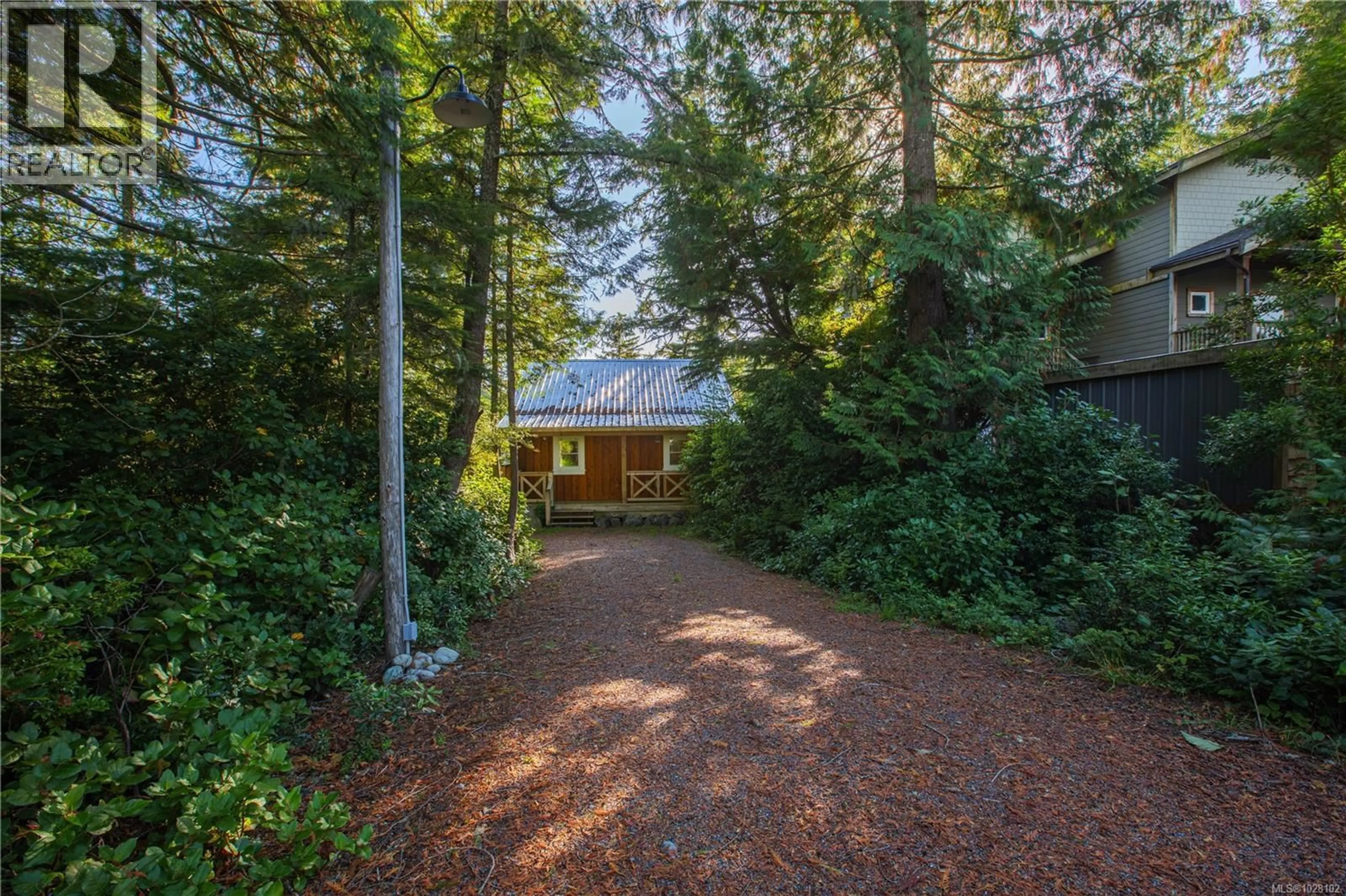 A pic from outside/outdoor area/front of a property/back of a property/a pic from drone, forest/trees view for 225 BOARDWALK BOULEVARD, Ucluelet British Columbia V0R3A0