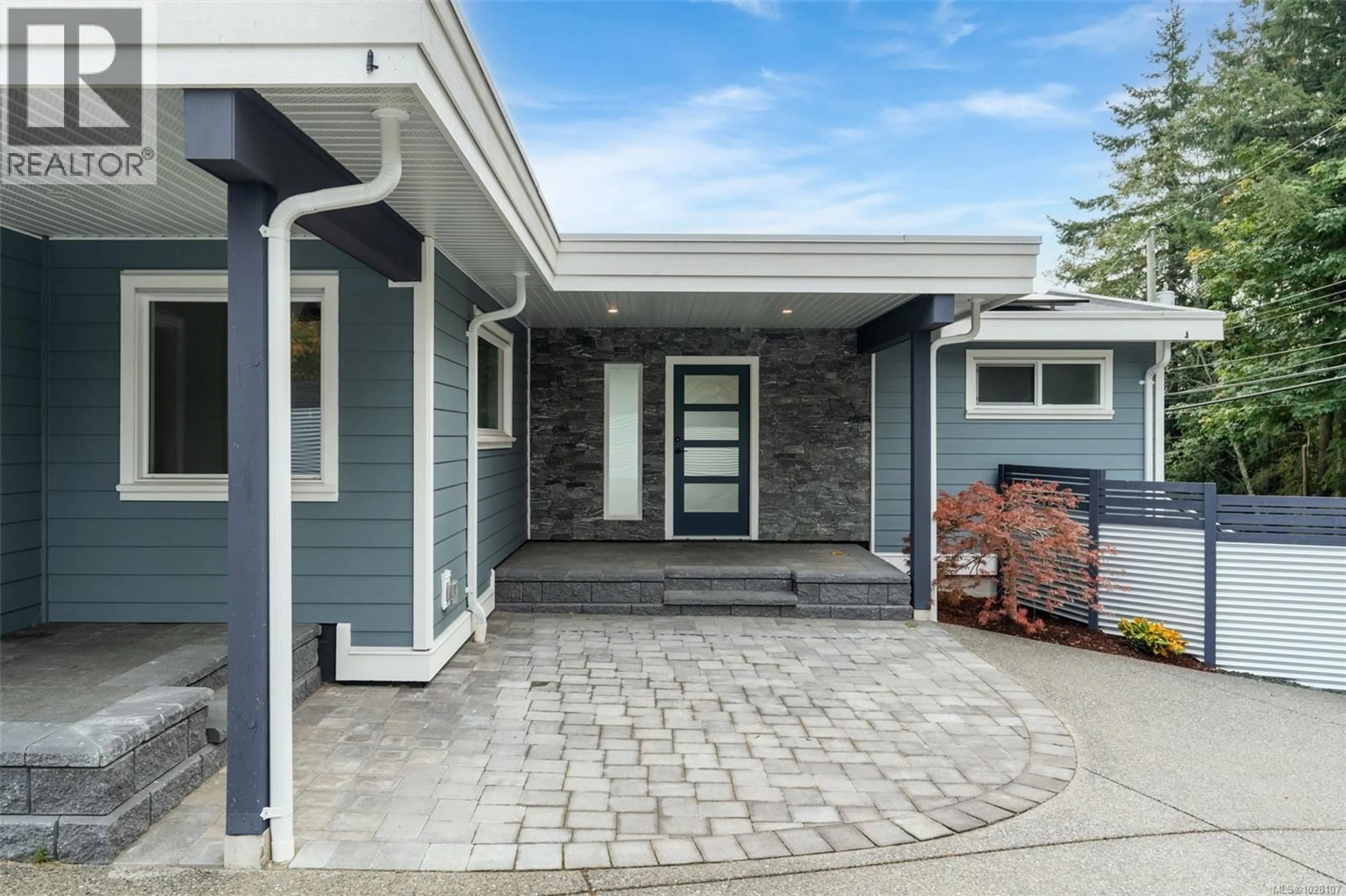 Home with brick exterior material, street for 667 NOOWICK ROAD, Mill Bay British Columbia V8H1G5