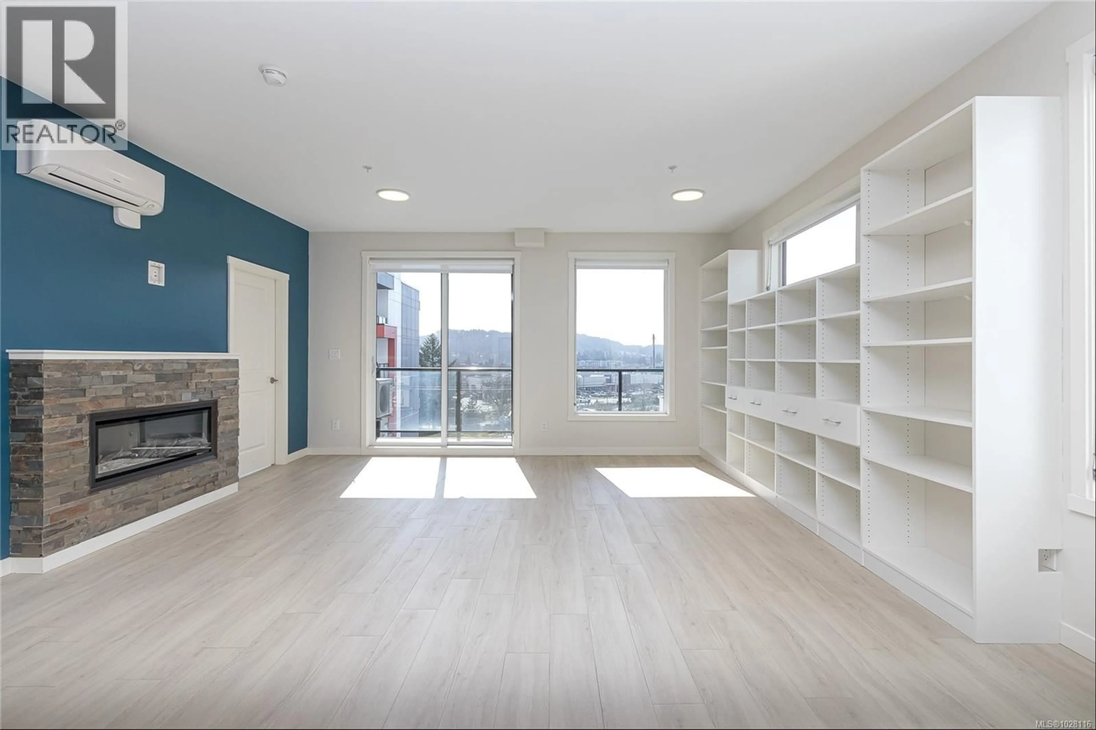 Living room with furniture, wood/laminate floor for 507 - 810 ORONO AVENUE, Langford British Columbia V9B6Y9