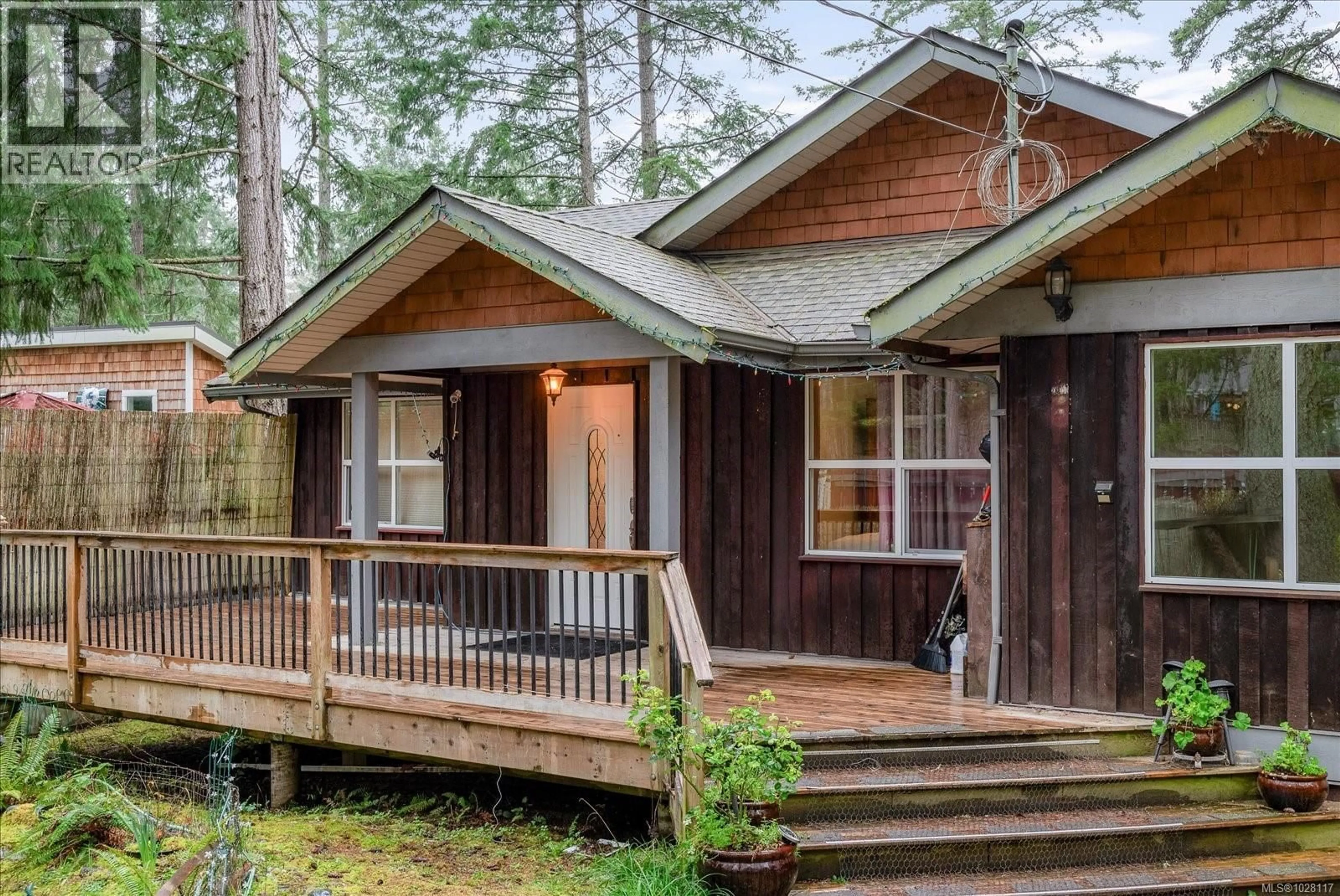 Home with vinyl exterior material, street for 685 ROLLO ROAD, Gabriola Island British Columbia V0R1X3