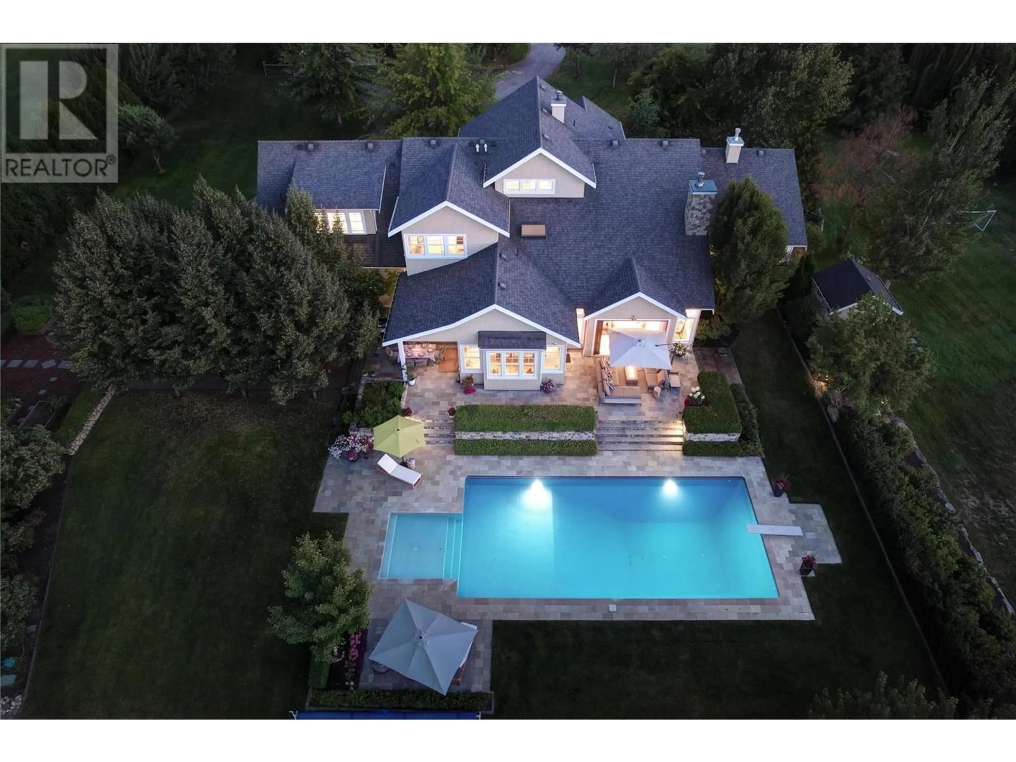 A pic from outside/outdoor area/front of a property/back of a property/a pic from drone, unknown for 4079 JUNE SPRINGS ROAD, Kelowna British Columbia V1W4E2
