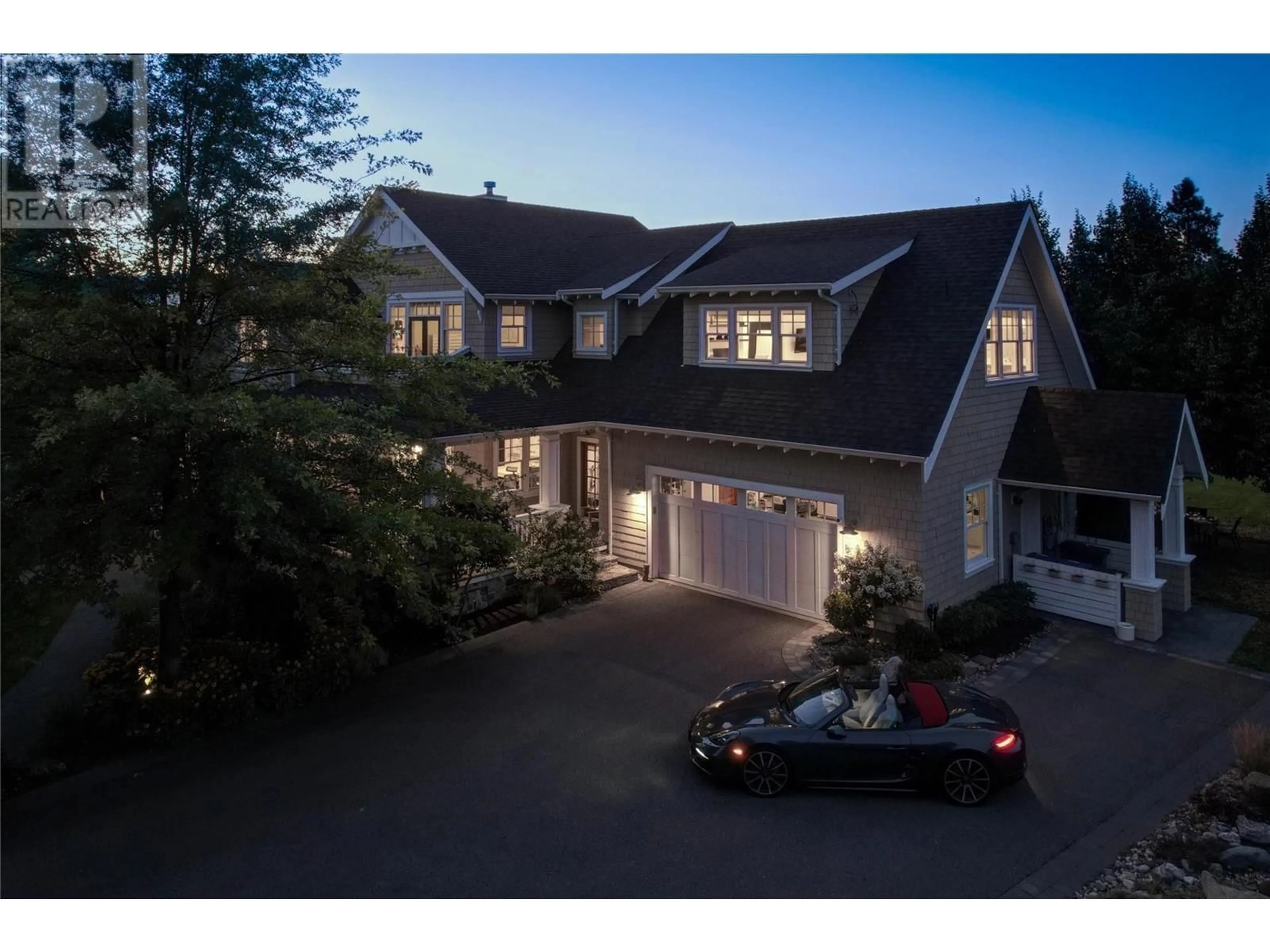 A pic from outside/outdoor area/front of a property/back of a property/a pic from drone, street for 4079 JUNE SPRINGS ROAD, Kelowna British Columbia V1W4E2