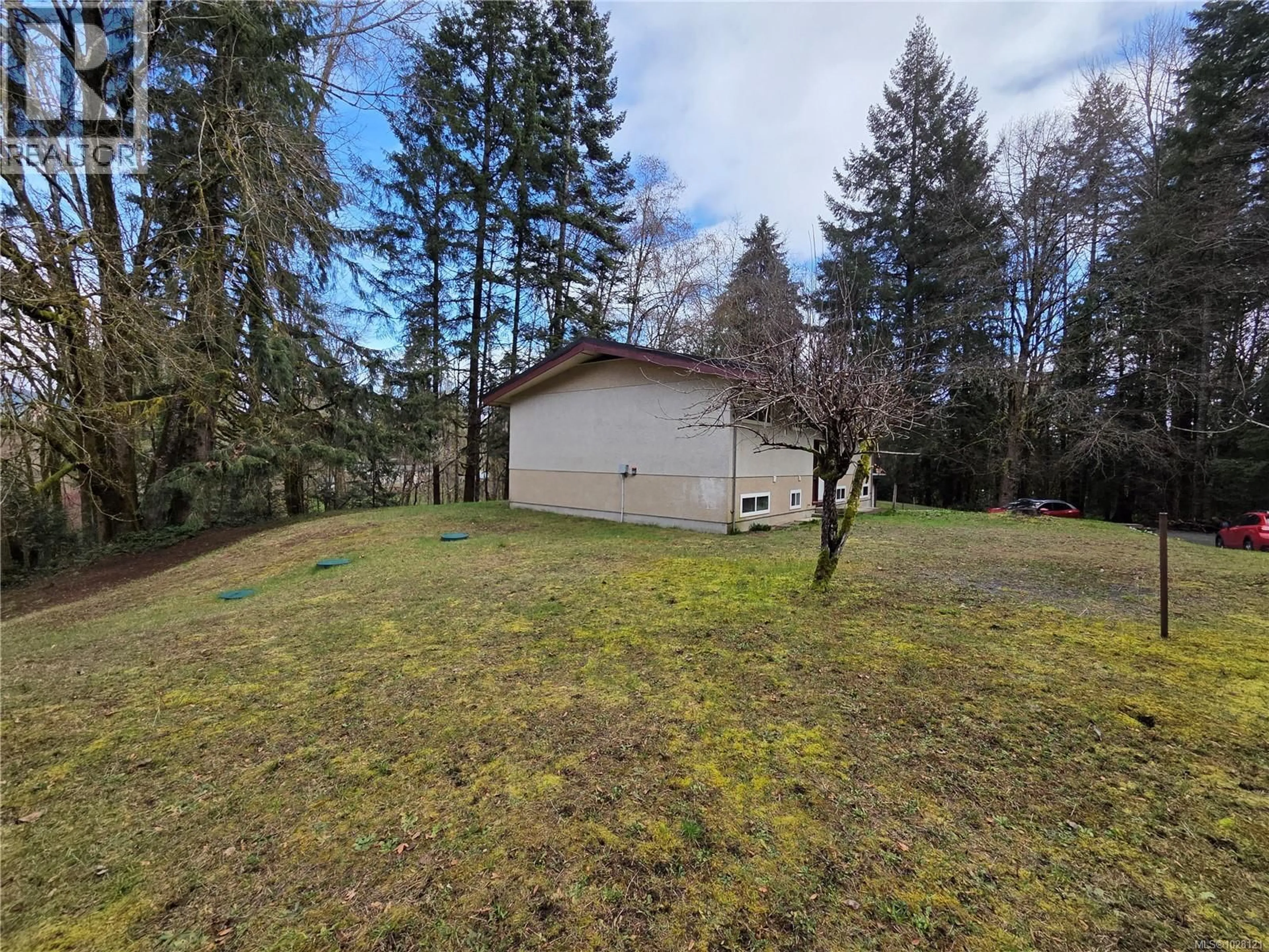 A pic from outside/outdoor area/front of a property/back of a property/a pic from drone, forest/trees view for 3246 GIBBINS ROAD, Duncan British Columbia V9L1G8