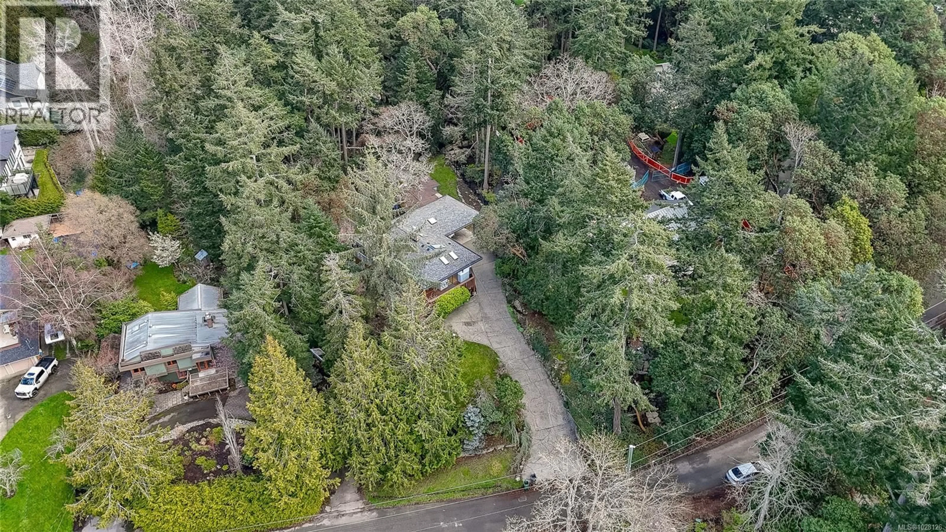 A pic from outside/outdoor area/front of a property/back of a property/a pic from drone, forest/trees view for 2660 MACDONALD DRIVE EAST, Saanich British Columbia V8N1X9