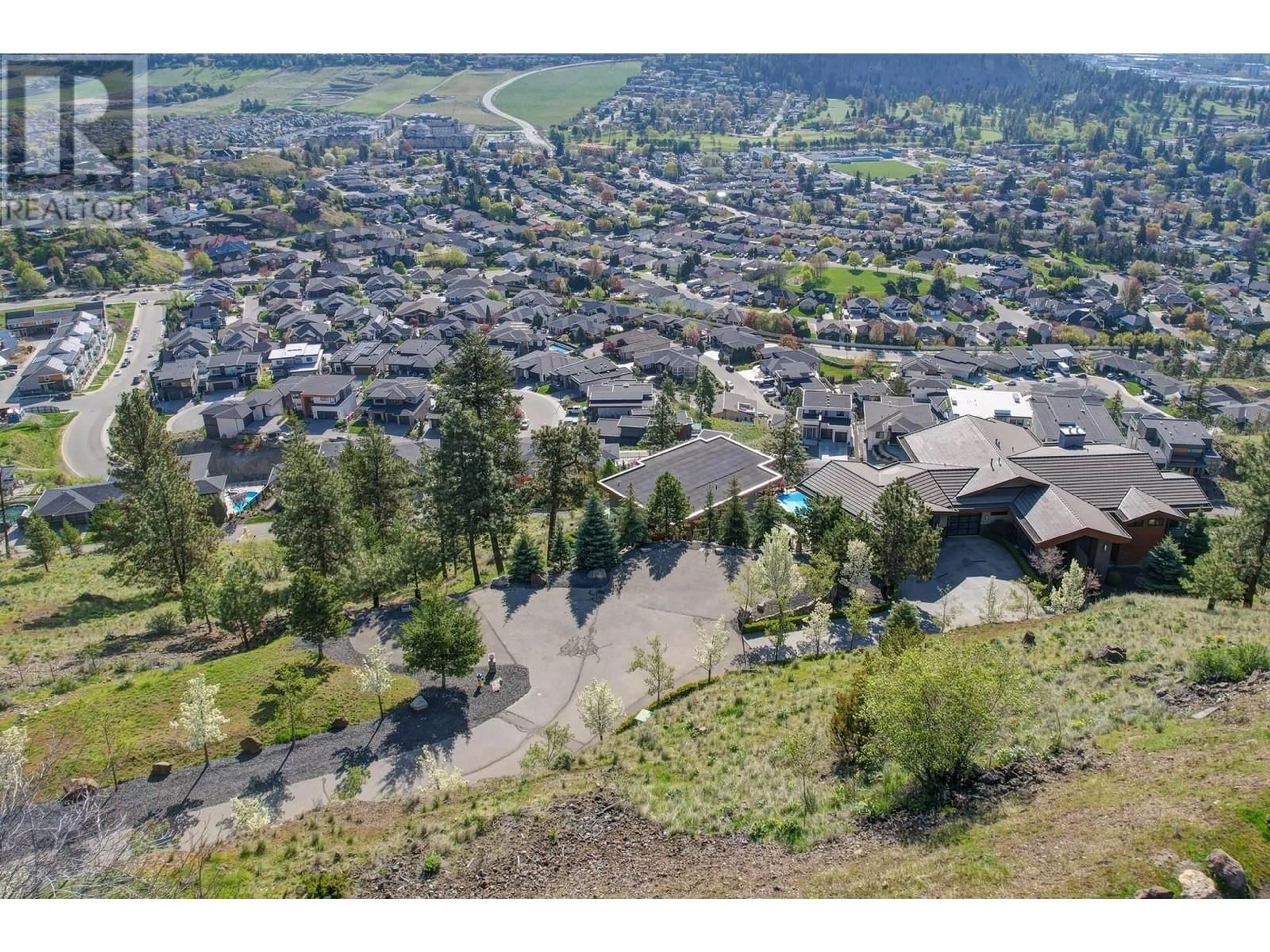A pic from outside/outdoor area/front of a property/back of a property/a pic from drone, mountain view for 733 FORESTRIDGE LANE, Kelowna British Columbia V6E0C5