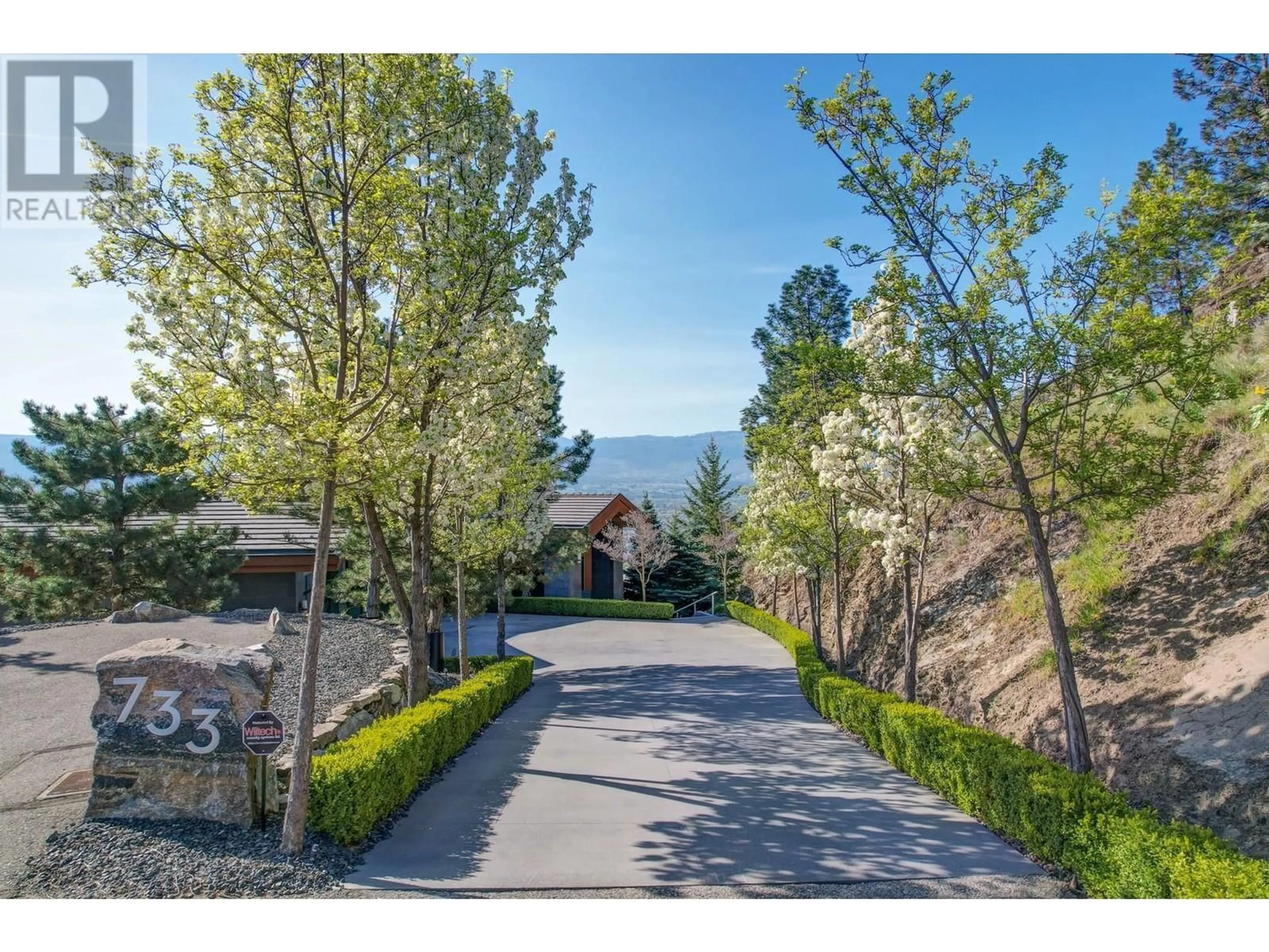 A pic from outside/outdoor area/front of a property/back of a property/a pic from drone, unknown for 733 FORESTRIDGE LANE, Kelowna British Columbia V6E0C5