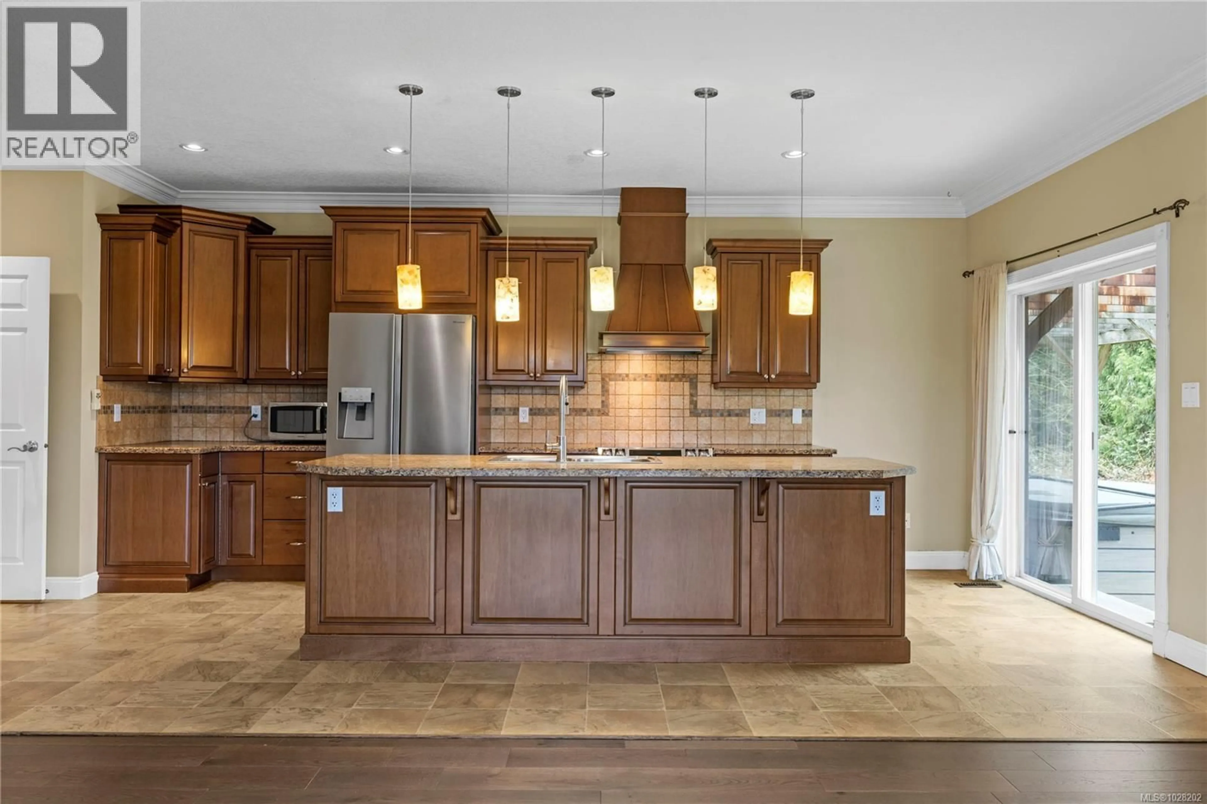 Open concept kitchen, ceramic/tile floor for 2865 MUNROE ROAD, Nanaimo British Columbia V9R6X4