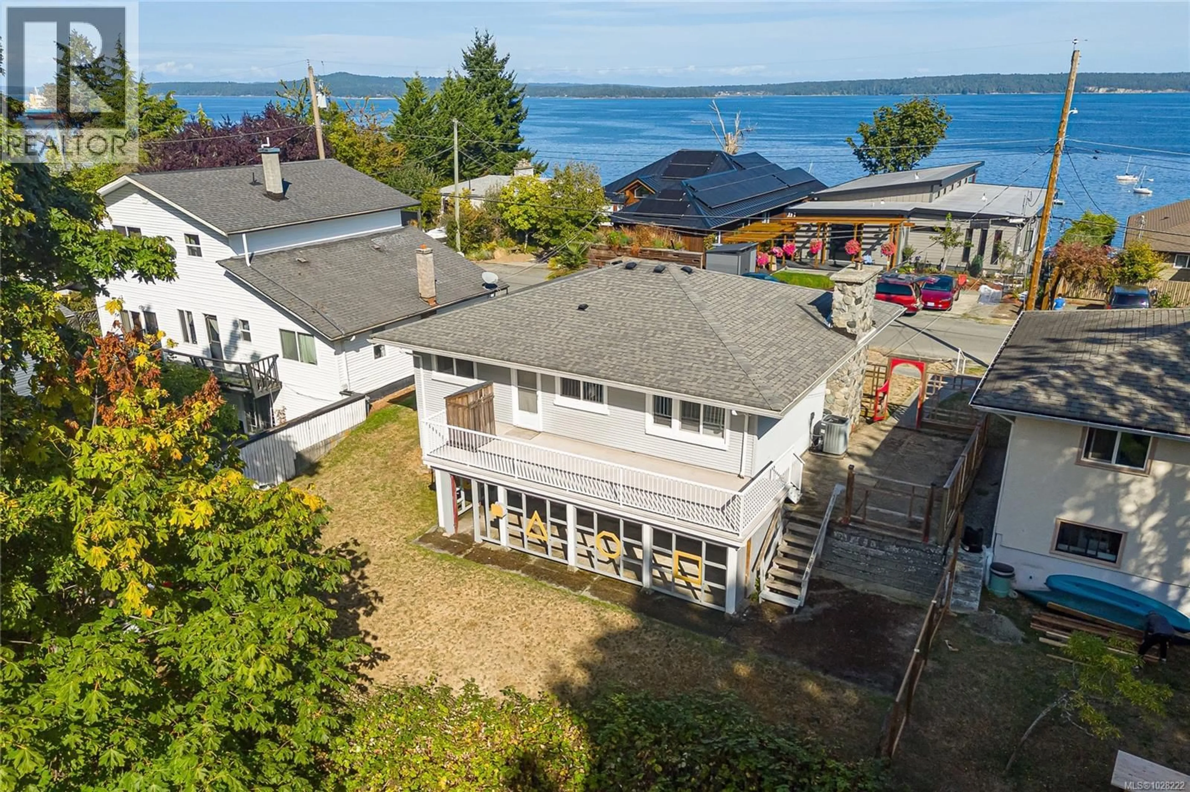 A pic from outside/outdoor area/front of a property/back of a property/a pic from drone, water/lake/river/ocean view for 9992 BEACH DRIVE, Chemainus British Columbia V0R1K1