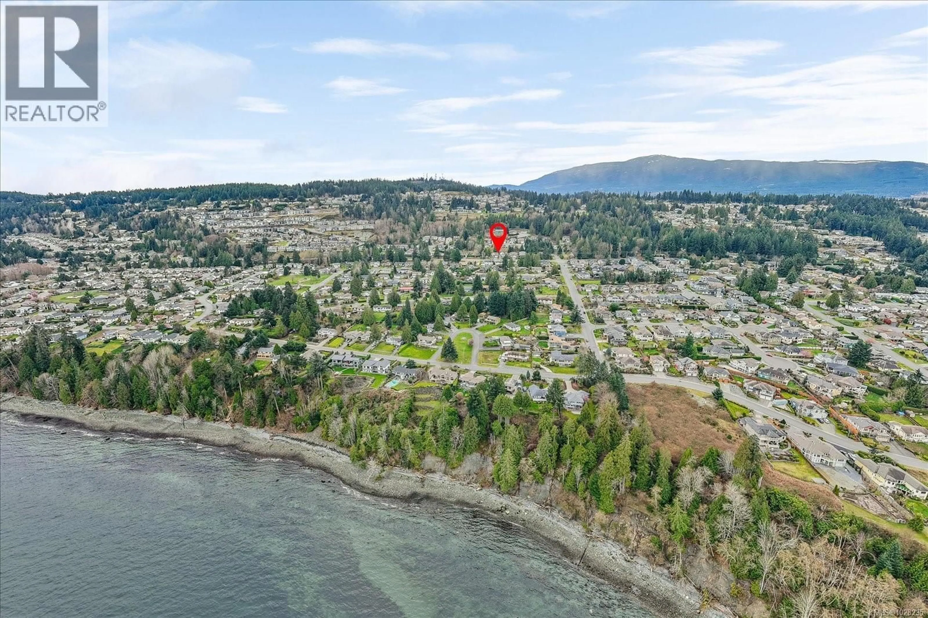 A pic from outside/outdoor area/front of a property/back of a property/a pic from drone, water/lake/river/ocean view for 5541 HAMMOND BAY ROAD, Nanaimo British Columbia V9T5N1