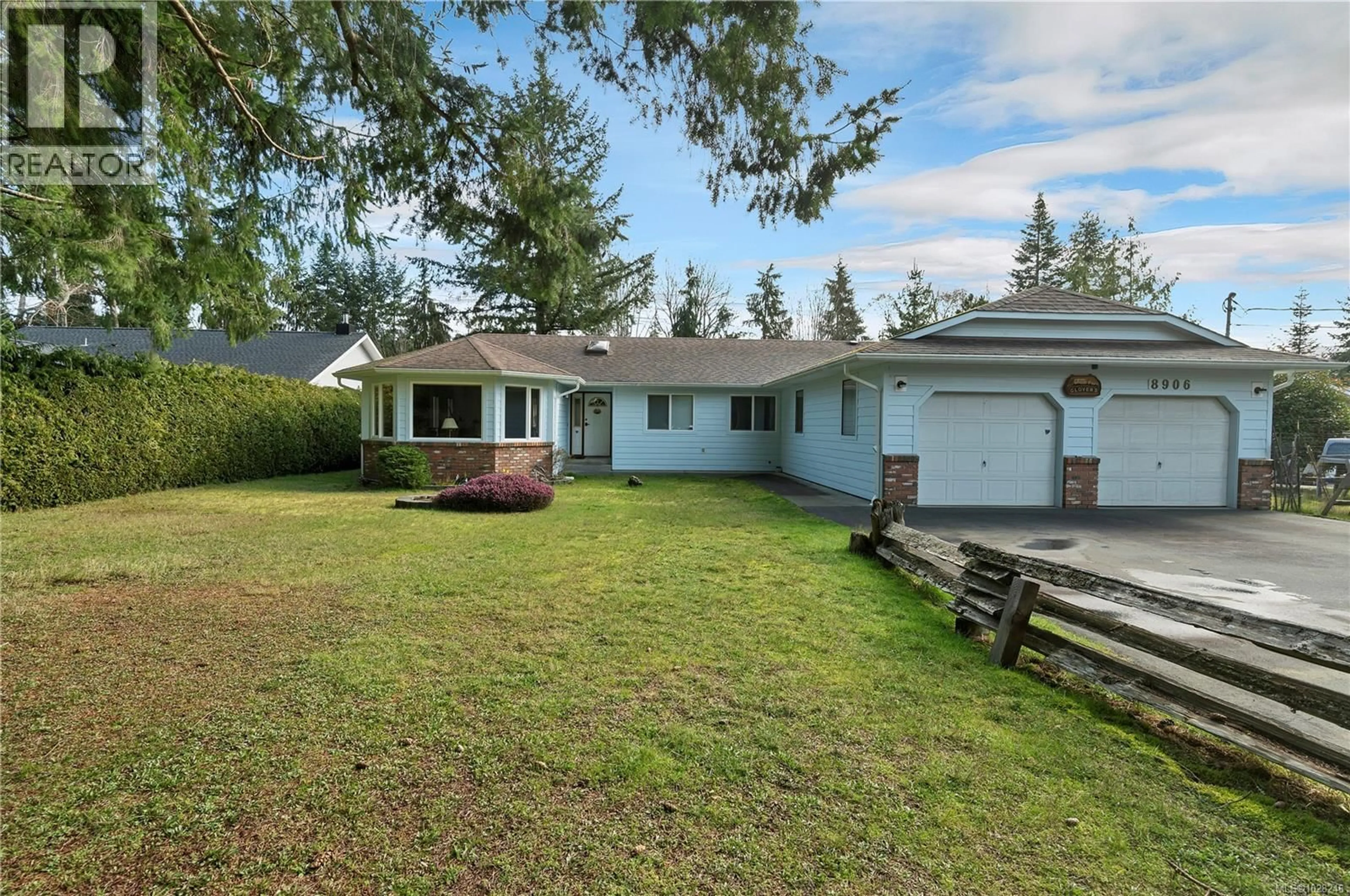 A pic from outside/outdoor area/front of a property/back of a property/a pic from drone, street for 8906 MCLAREY AVENUE, Black Creek British Columbia V9J1A3