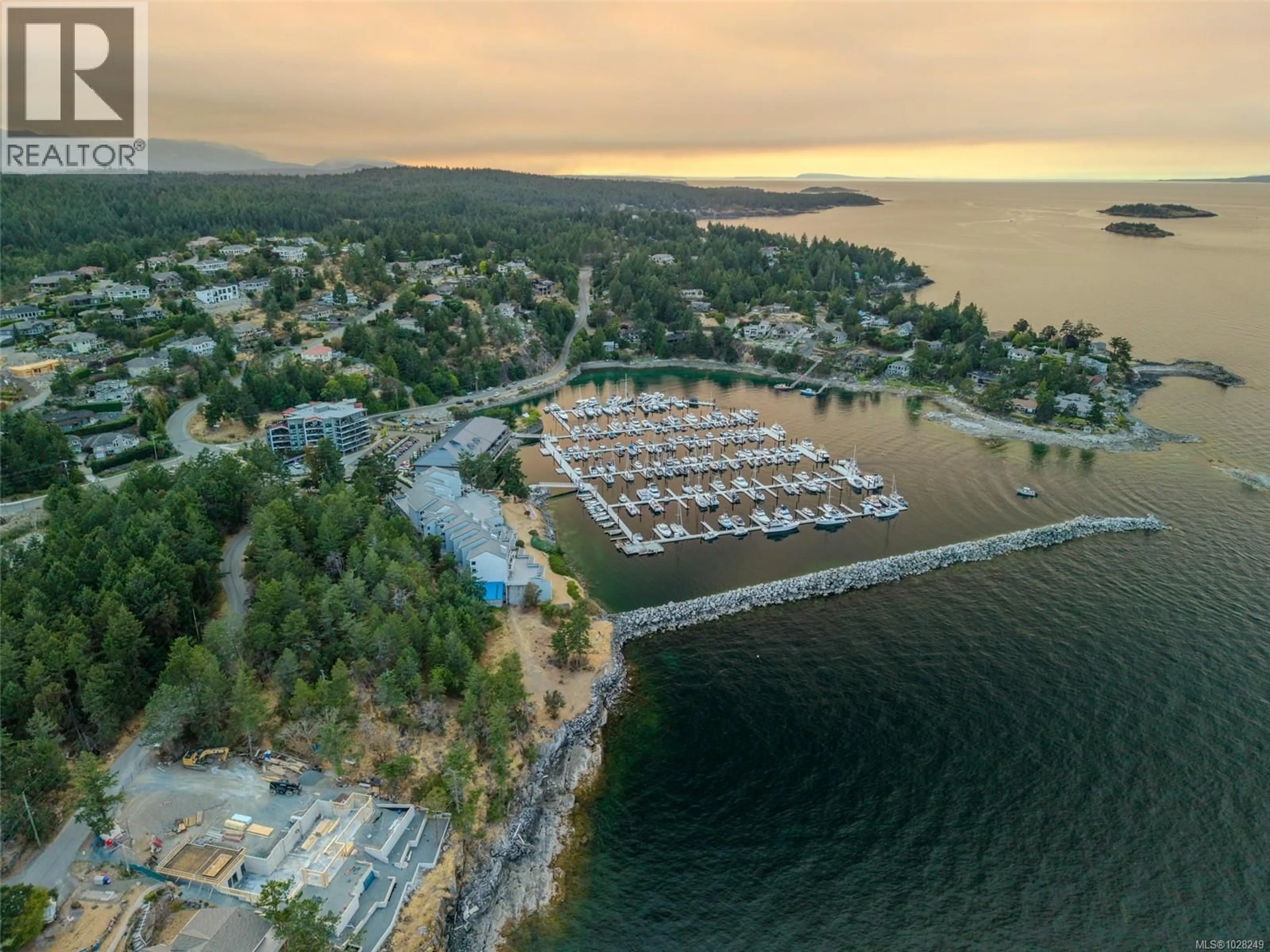 A pic from outside/outdoor area/front of a property/back of a property/a pic from drone, water/lake/river/ocean view for 403 - 3555 OUTRIGGER ROAD, Nanoose Bay British Columbia V9P9K1