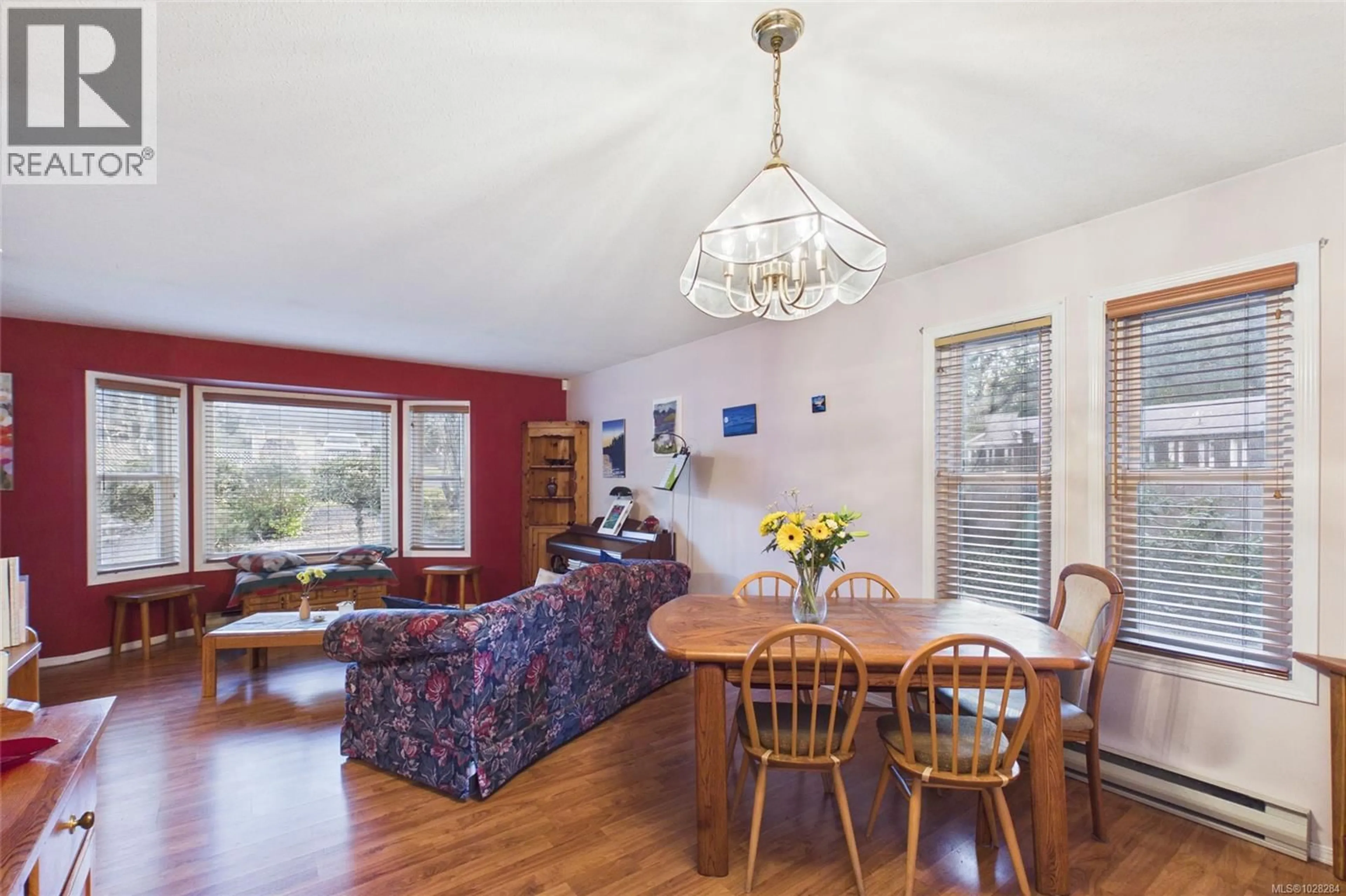 Dining room, wood/laminate floor for 227 THETIS AVENUE, Qualicum Beach British Columbia V9K1R8