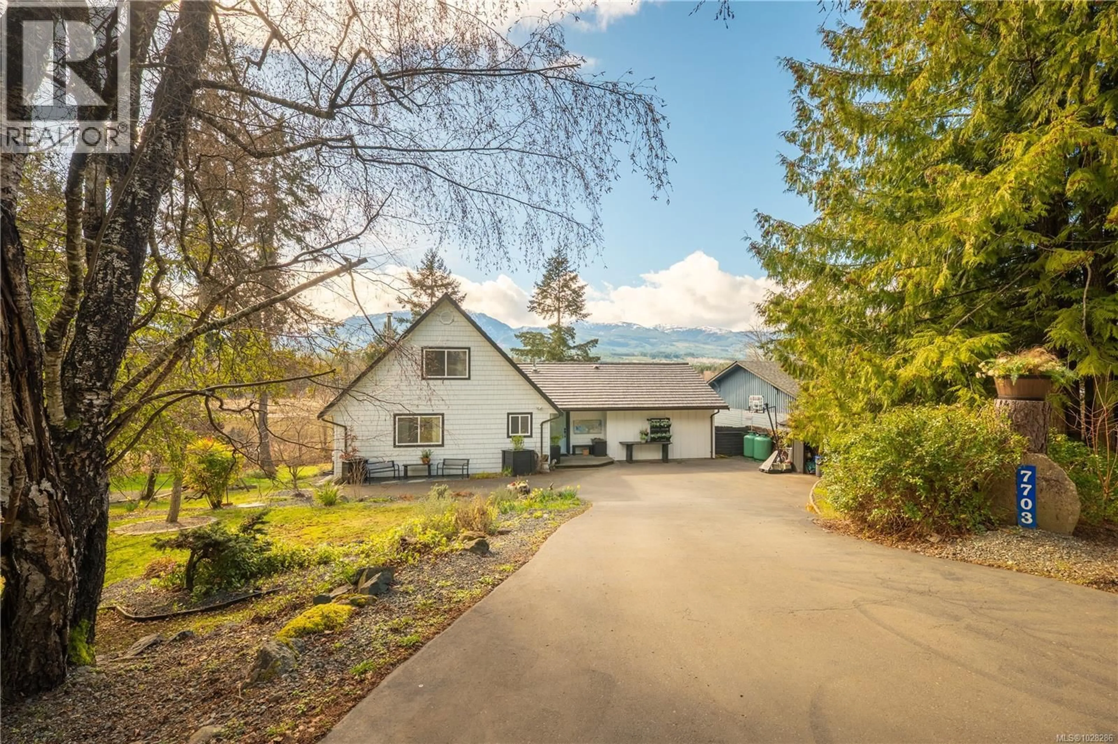 A pic from outside/outdoor area/front of a property/back of a property/a pic from drone, street for 7703 TOZER ROAD, Fanny Bay British Columbia V0R1W0