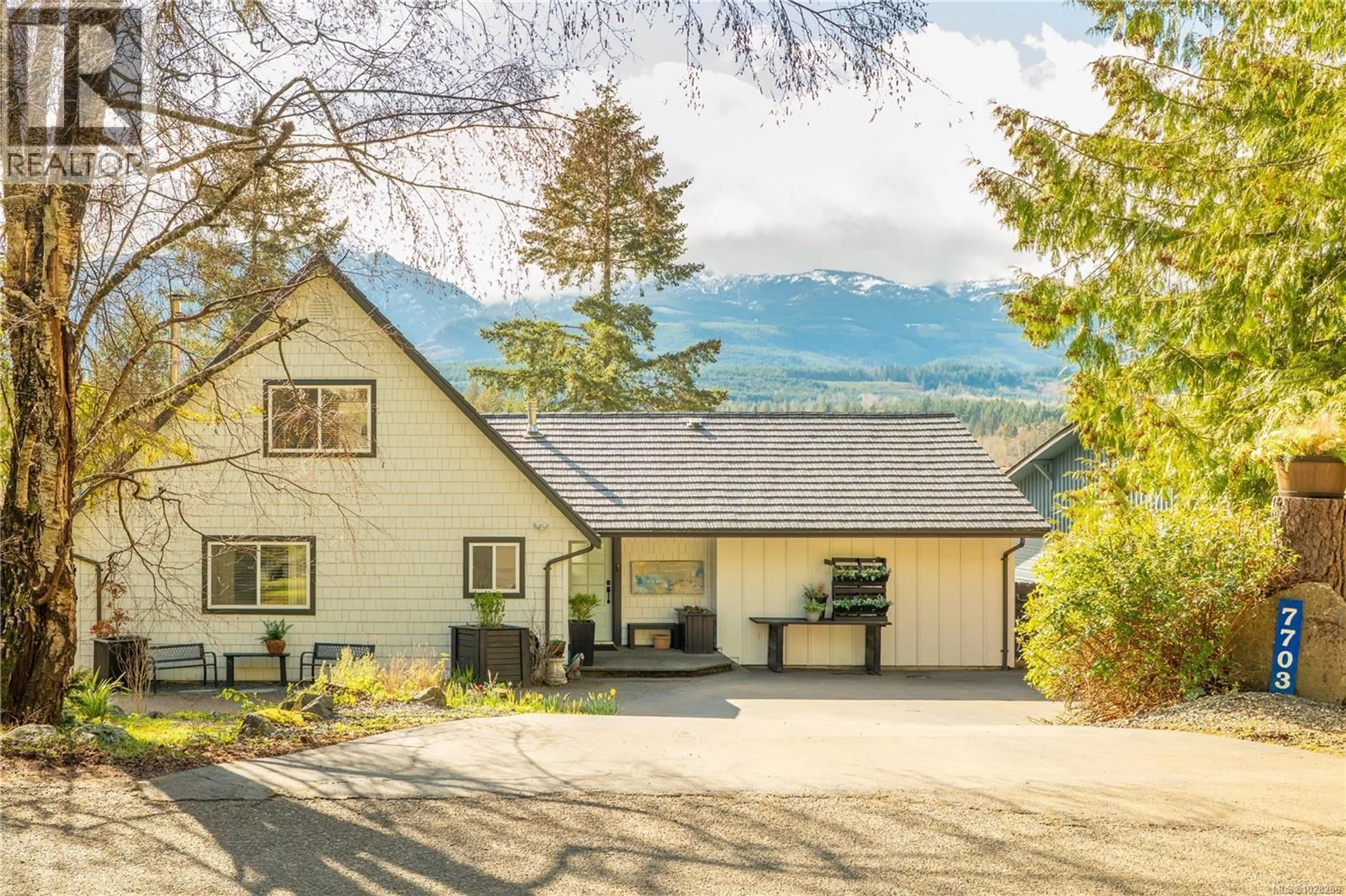 A pic from outside/outdoor area/front of a property/back of a property/a pic from drone, mountain view for 7703 TOZER ROAD, Fanny Bay British Columbia V0R1W0