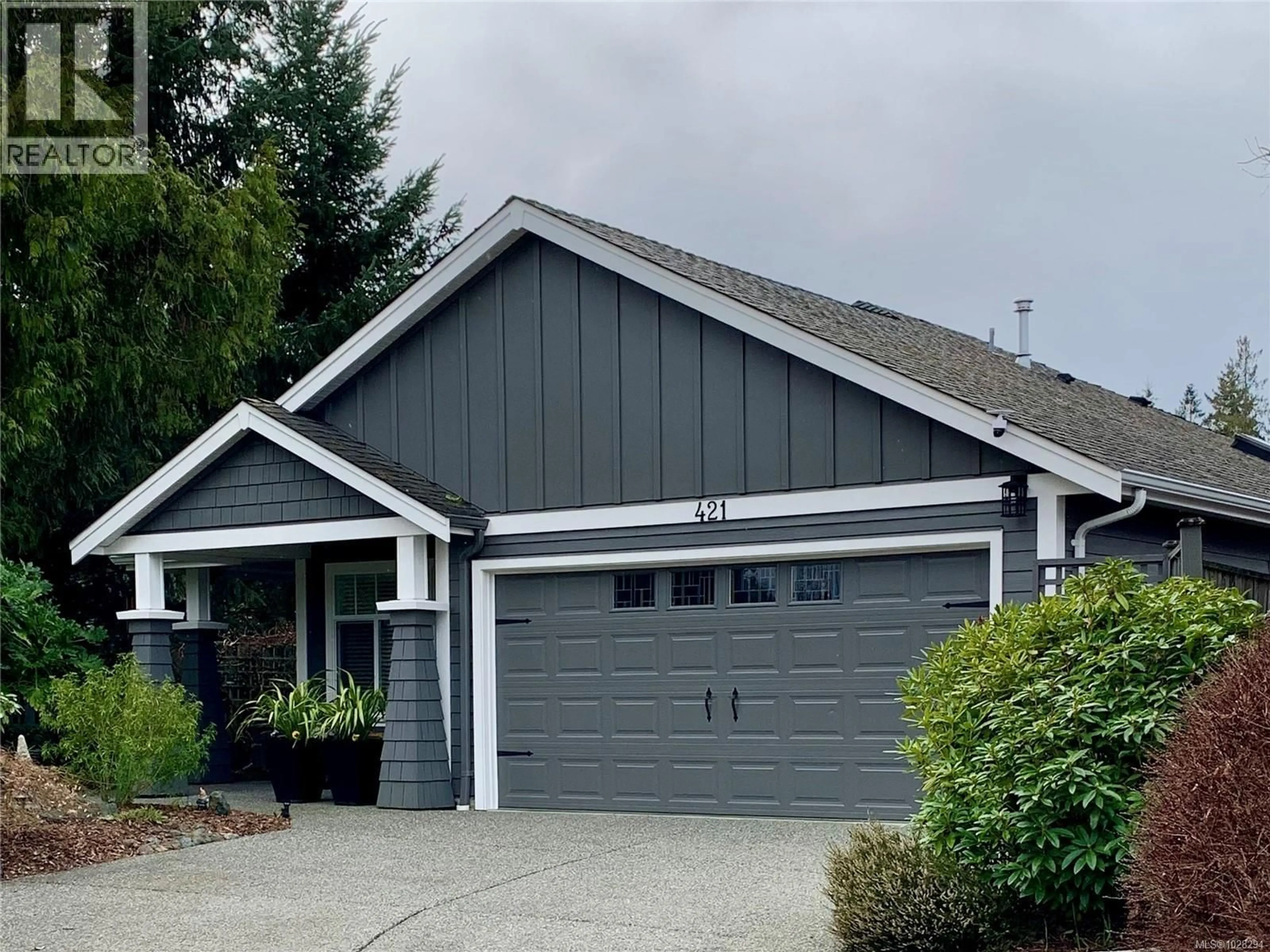 Home with vinyl exterior material, street for 421 DAY PLACE, Parksville British Columbia V9P1Z6