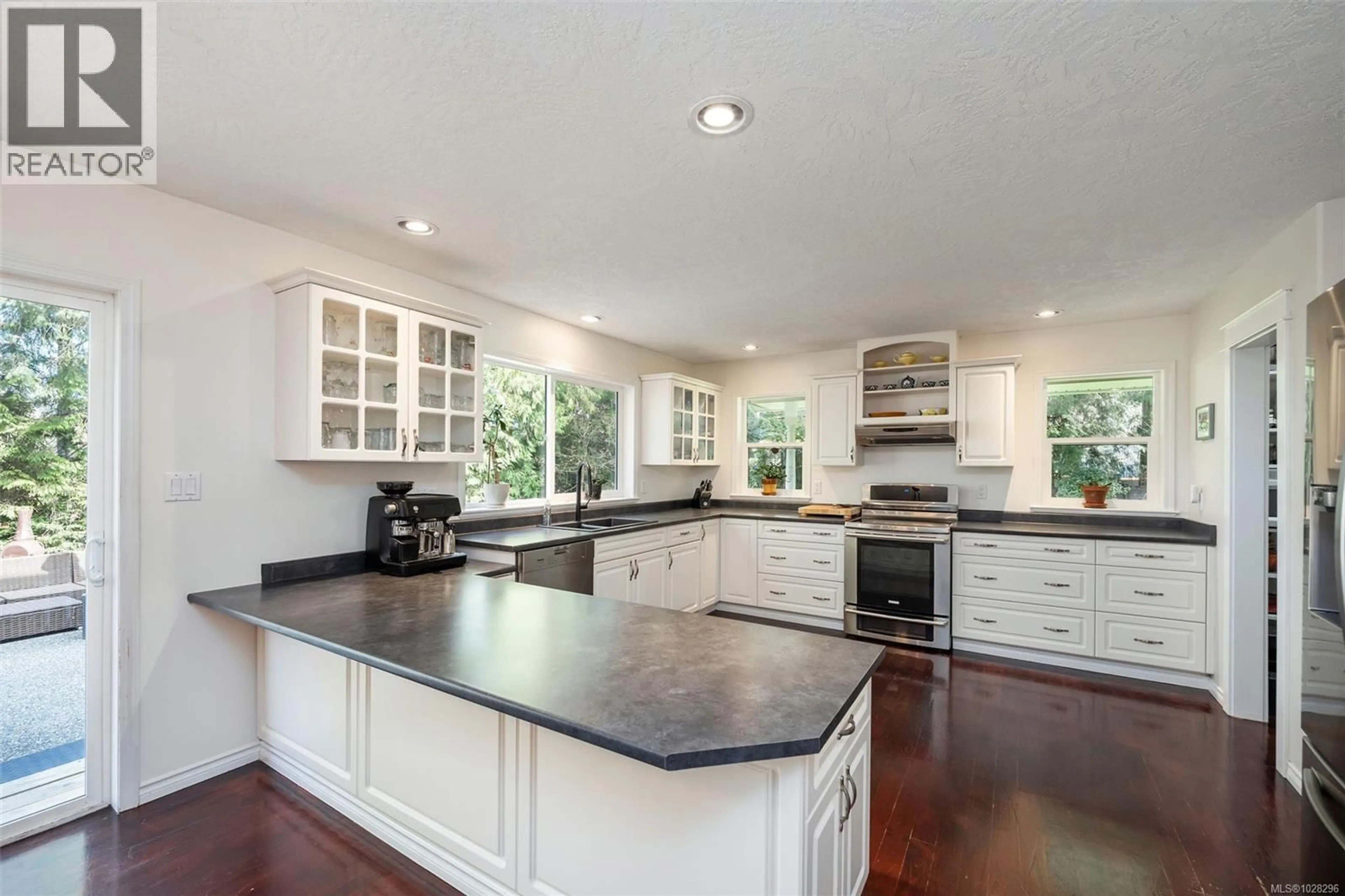 Open concept kitchen, ceramic/tile floor for 7210 HASE PLACE, Lantzville British Columbia V0R2H0