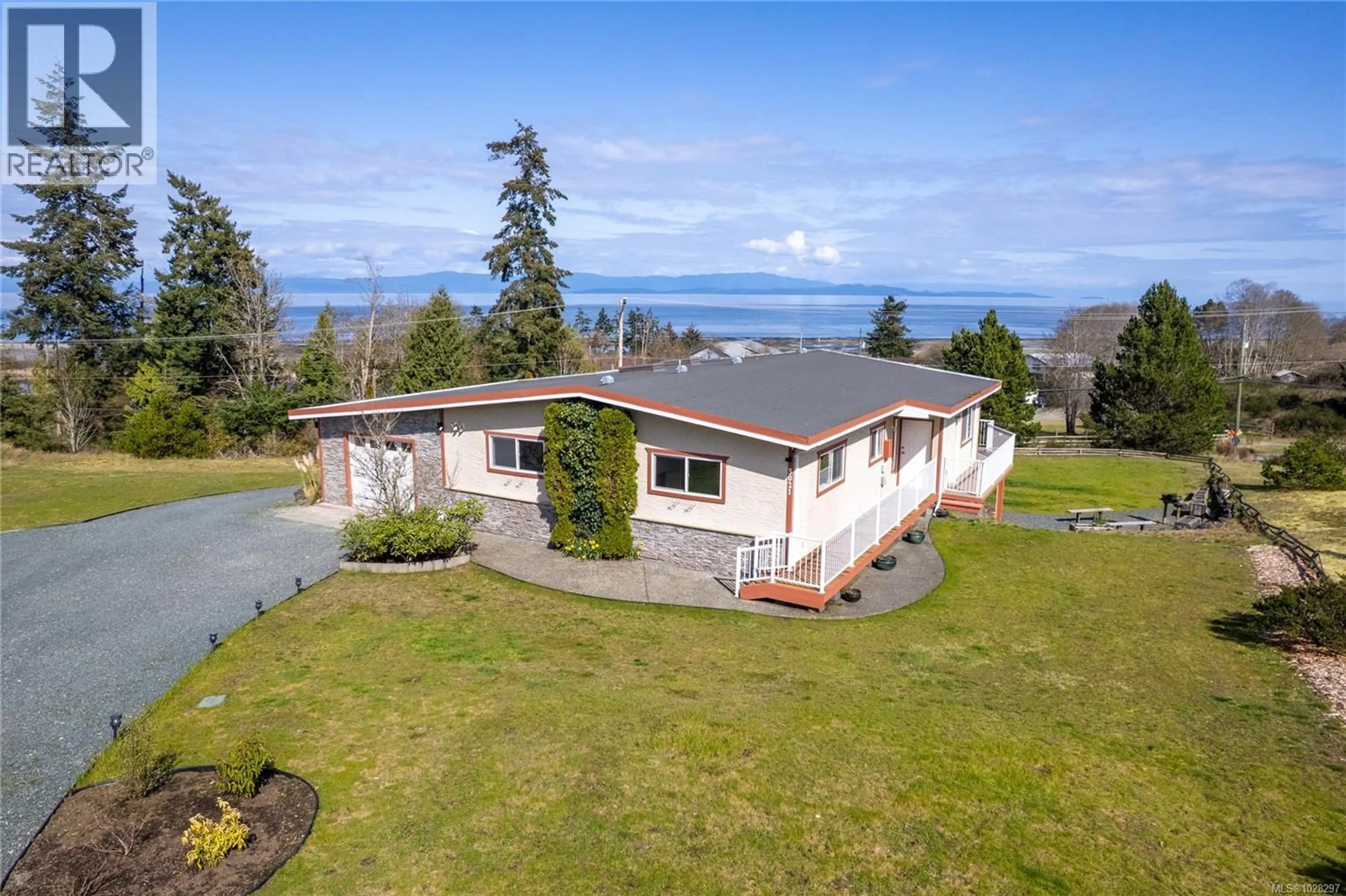 A pic from outside/outdoor area/front of a property/back of a property/a pic from drone, water/lake/river/ocean view for 3021 RAYMUR PLACE, Qualicum Beach British Columbia V9K2N9