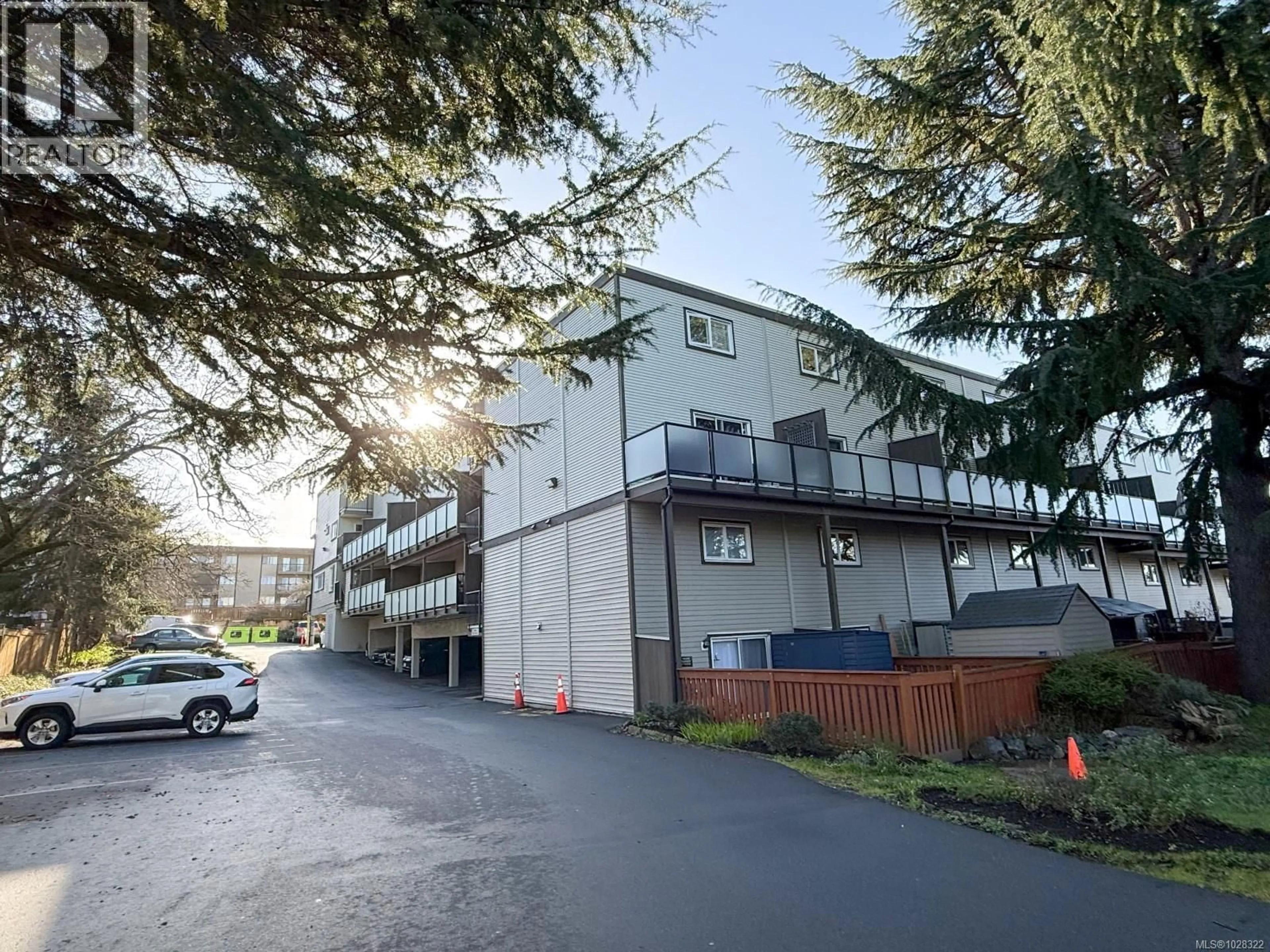 A pic from outside/outdoor area/front of a property/back of a property/a pic from drone, unknown for 212 - 991 CLOVERDALE AVENUE, Saanich British Columbia V8X2T5