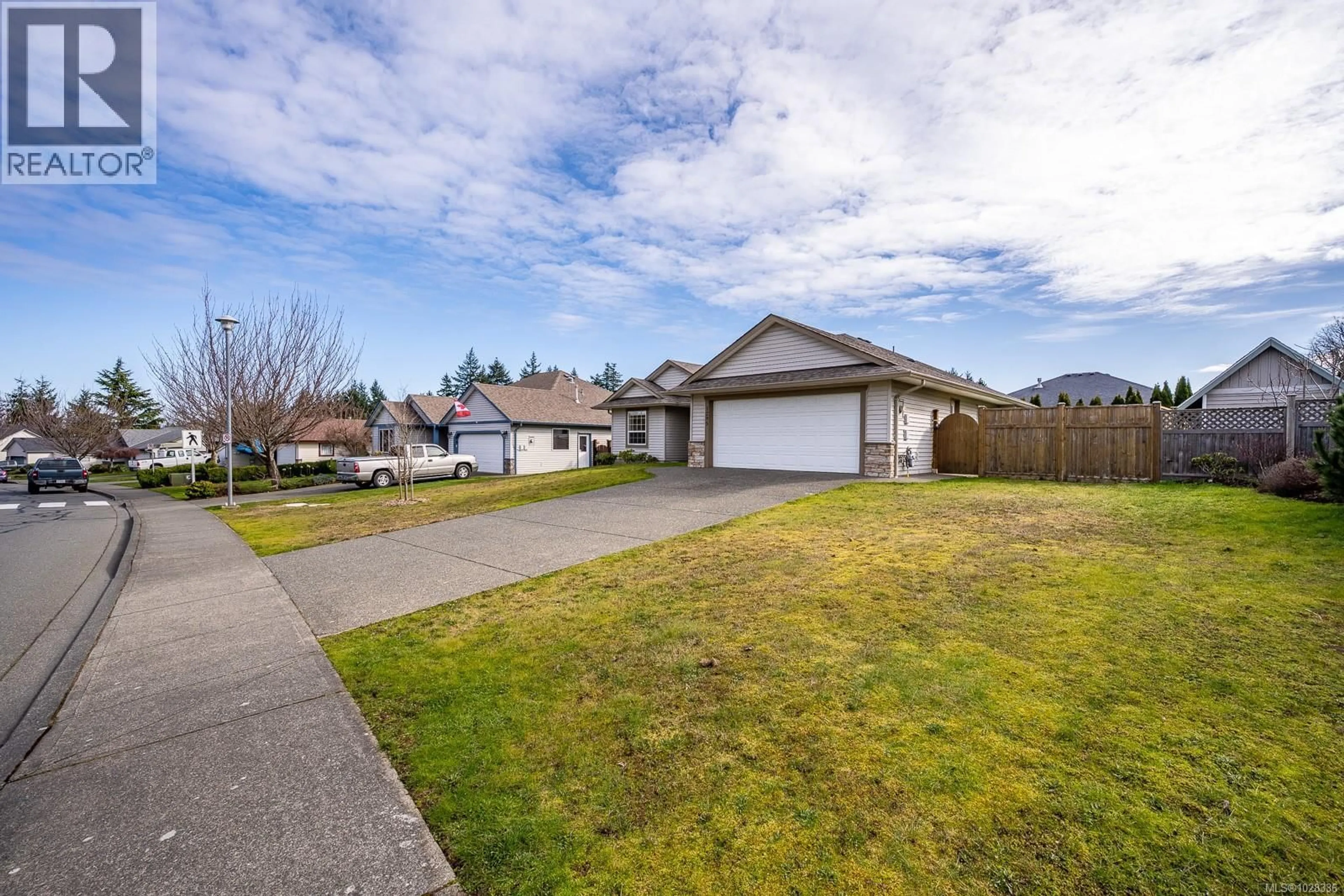 A pic from outside/outdoor area/front of a property/back of a property/a pic from drone, street for 1295 NOEL AVENUE, Comox British Columbia V9M4A3