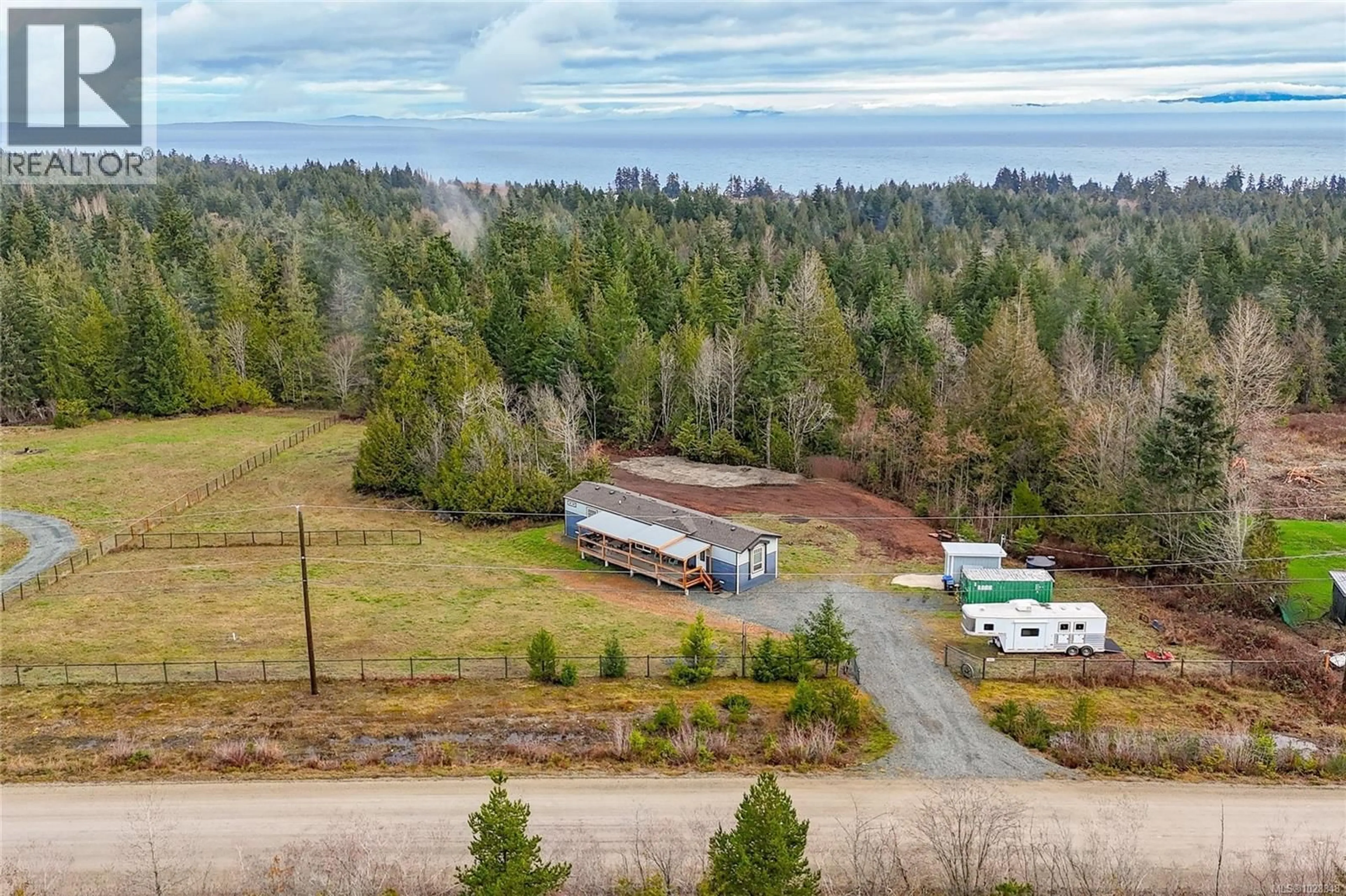 A pic from outside/outdoor area/front of a property/back of a property/a pic from drone, forest/trees view for 2845 WHISTLER ROAD, Qualicum Beach British Columbia V9K2L8