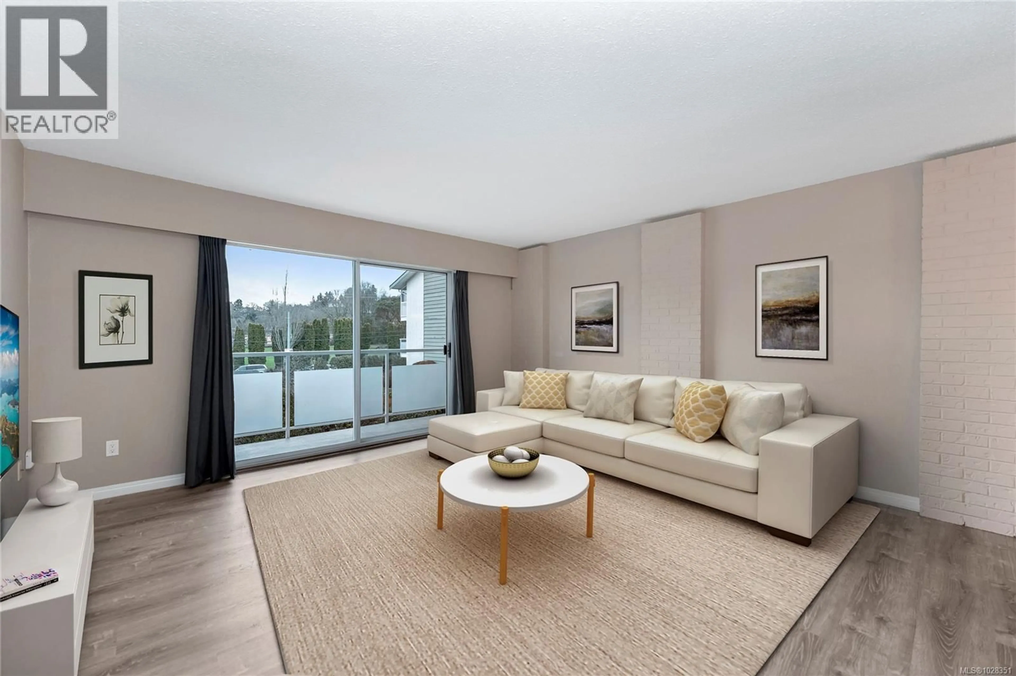 Living room with furniture, unknown for 205 - 1490 GARNET ROAD, Saanich British Columbia V8P5L1