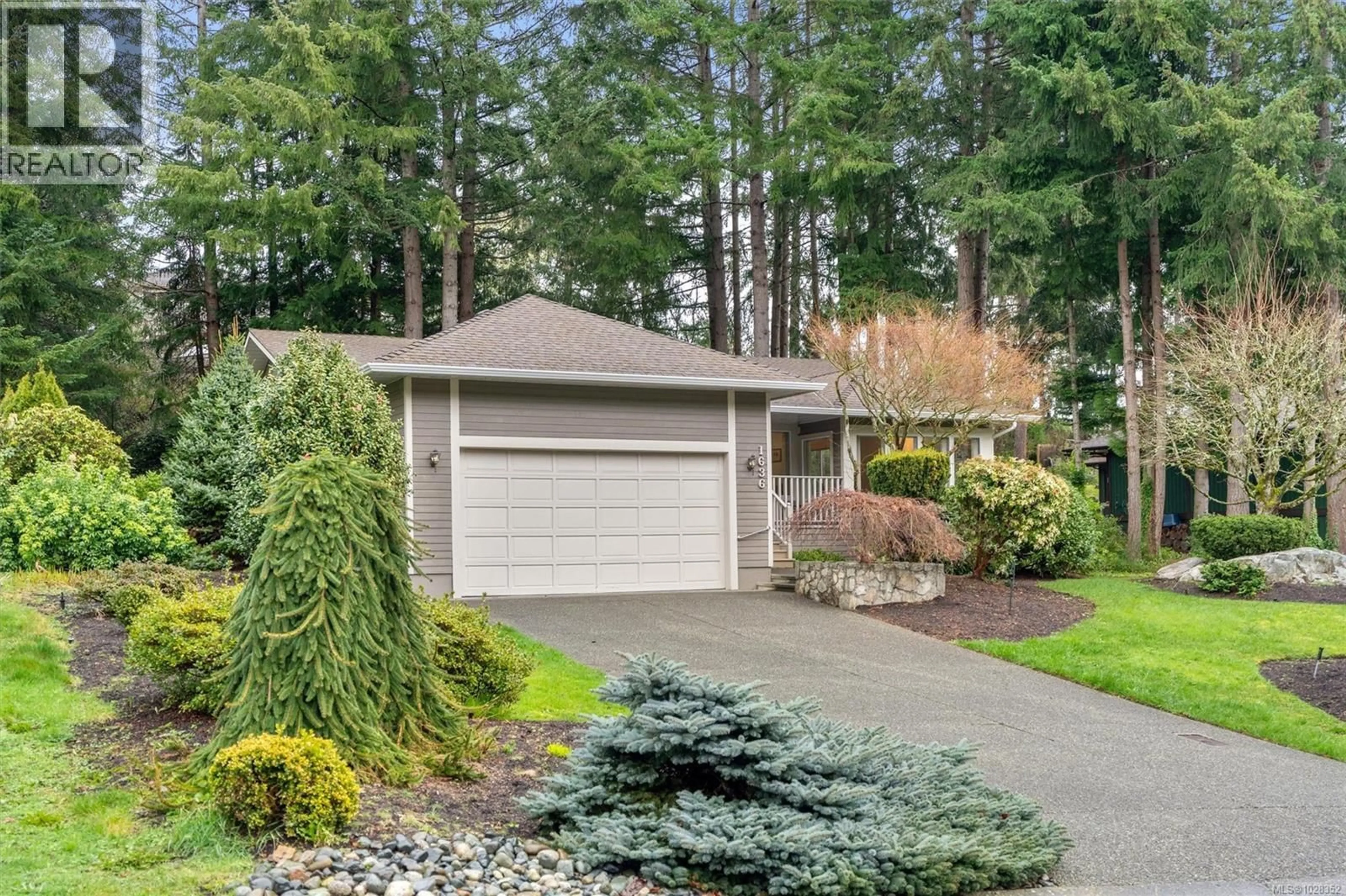 Home with vinyl exterior material, street for 1636 BARRETT DRIVE, North Saanich British Columbia V8L5A6