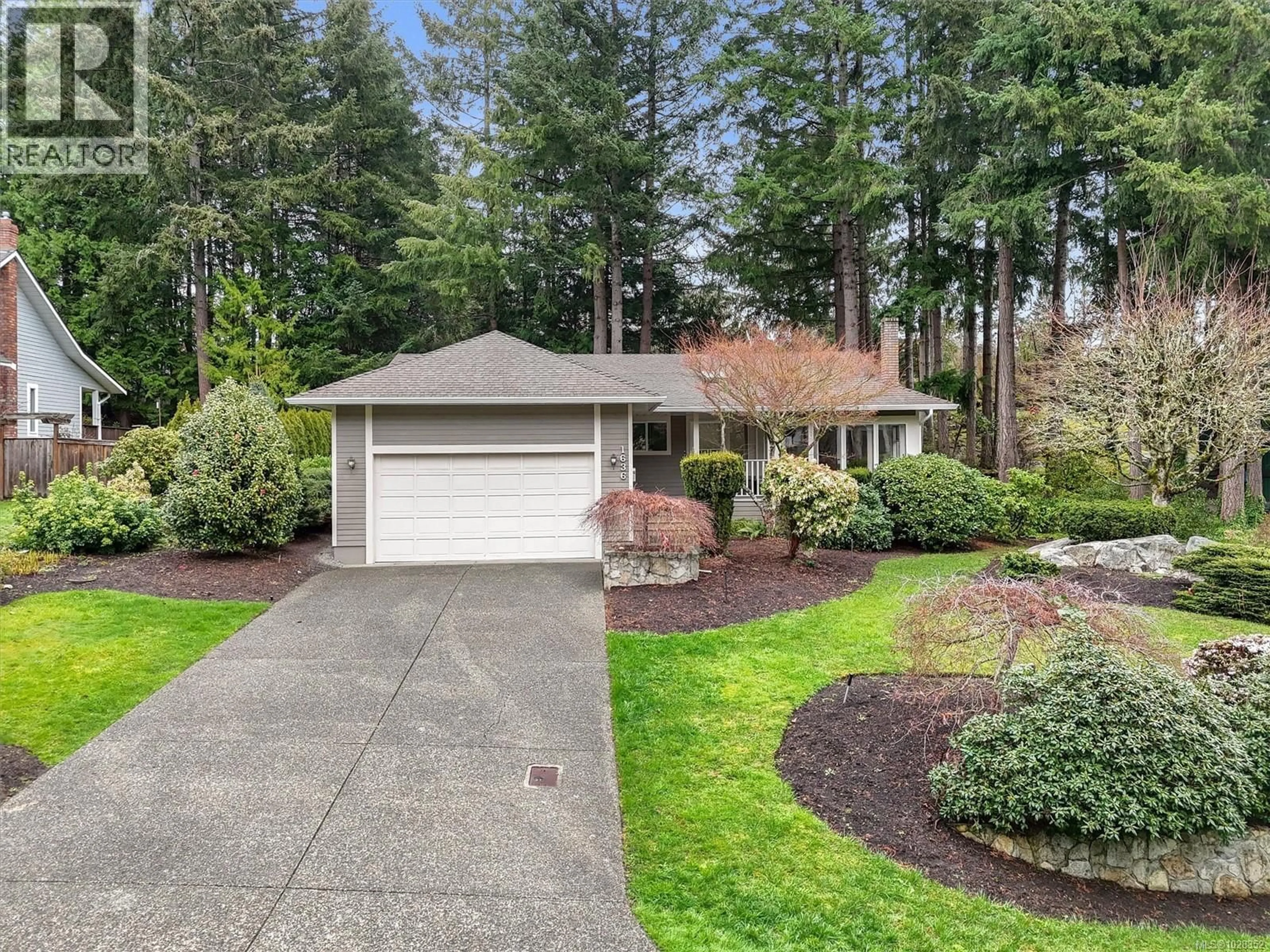 Home with vinyl exterior material, street for 1636 BARRETT DRIVE, North Saanich British Columbia V8L5A6