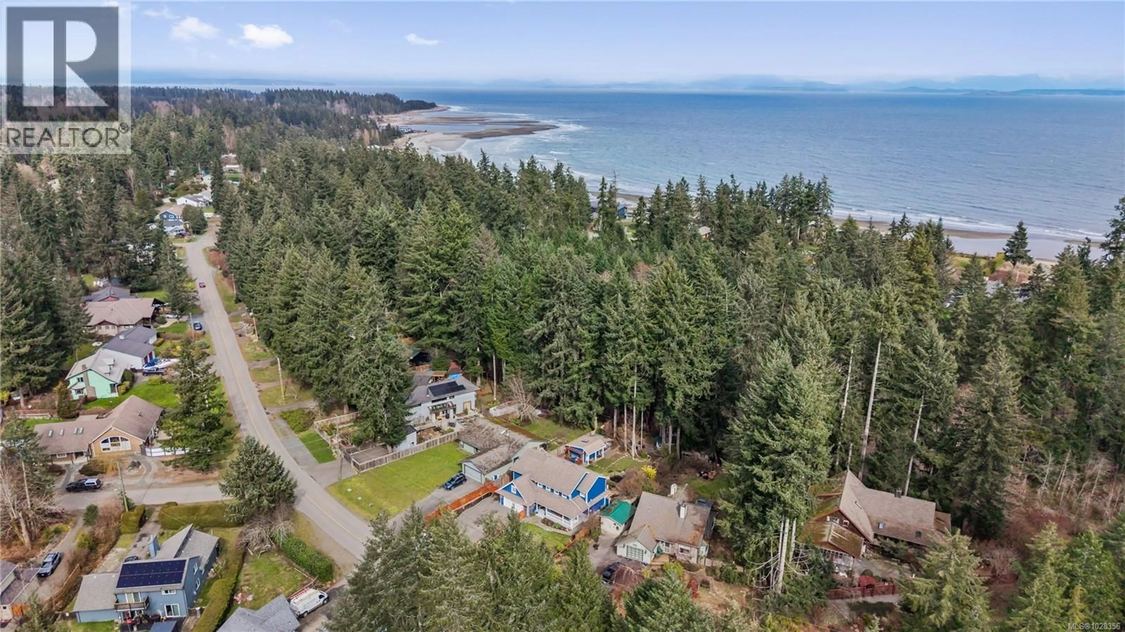A pic from outside/outdoor area/front of a property/back of a property/a pic from drone, water/lake/river/ocean view for 8800 CLARKSON AVENUE, Black Creek British Columbia V9J1A7