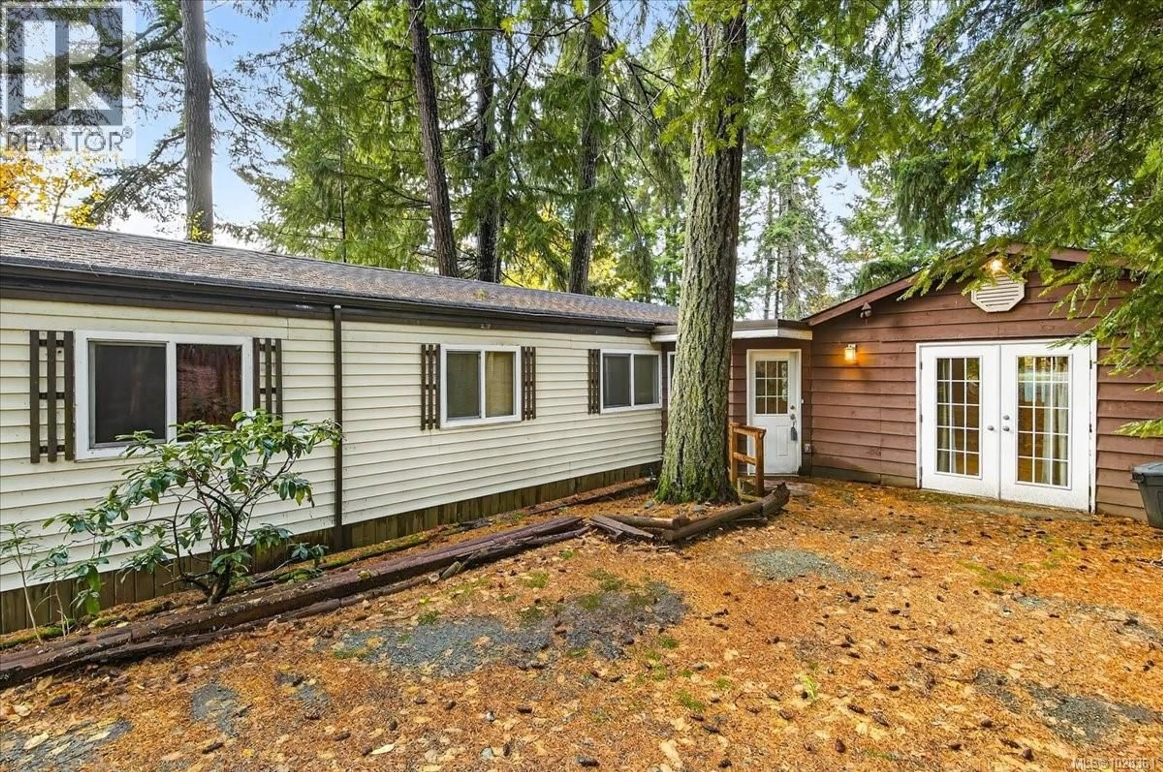 Home with vinyl exterior material, forest/trees view for 5560 KITSUKSIS ROAD, Port Alberni British Columbia V9Y8V8