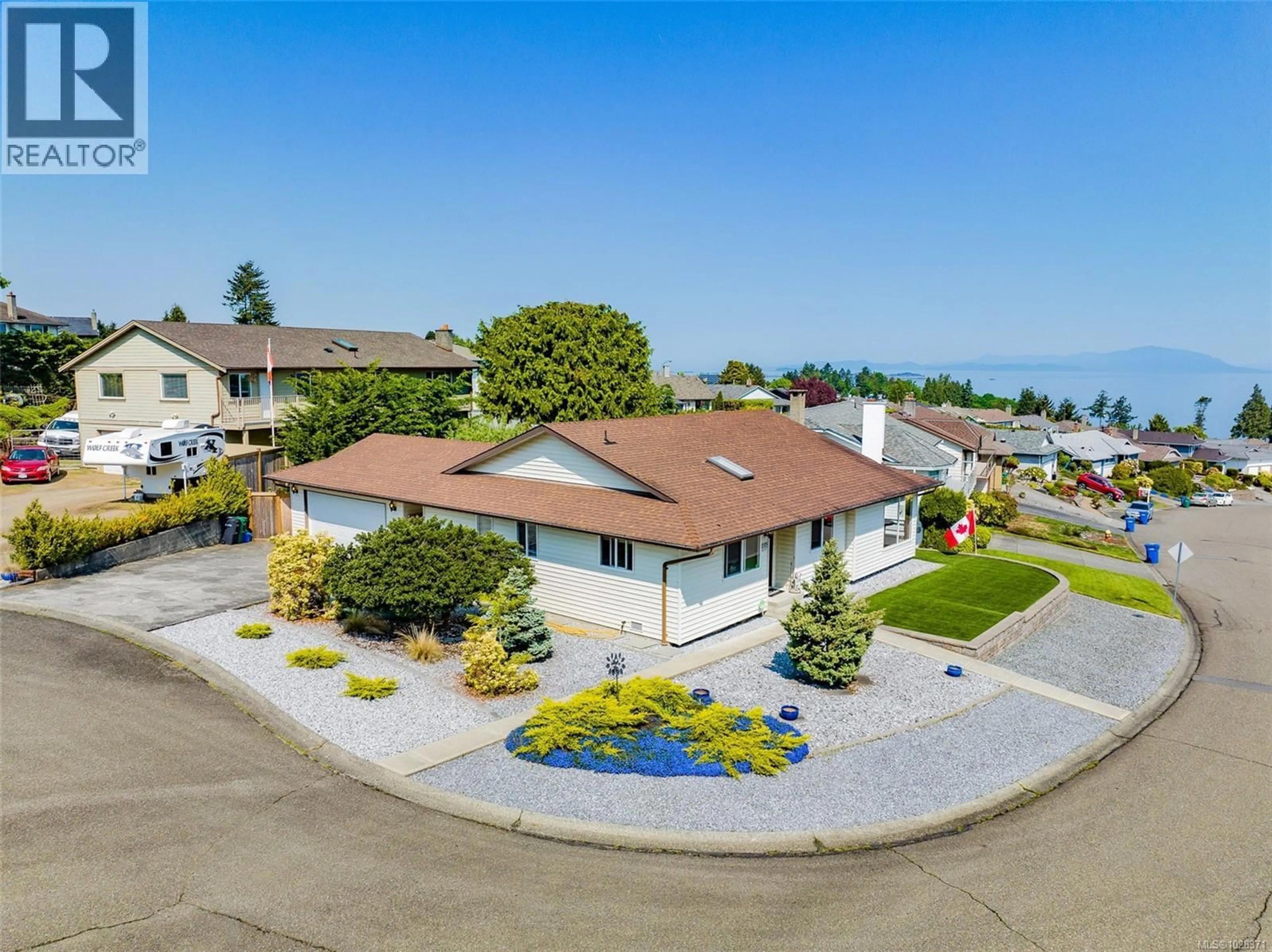 A pic from outside/outdoor area/front of a property/back of a property/a pic from drone, water/lake/river/ocean view for 6243 SECHELT DRIVE, Nanaimo British Columbia V9V1C6