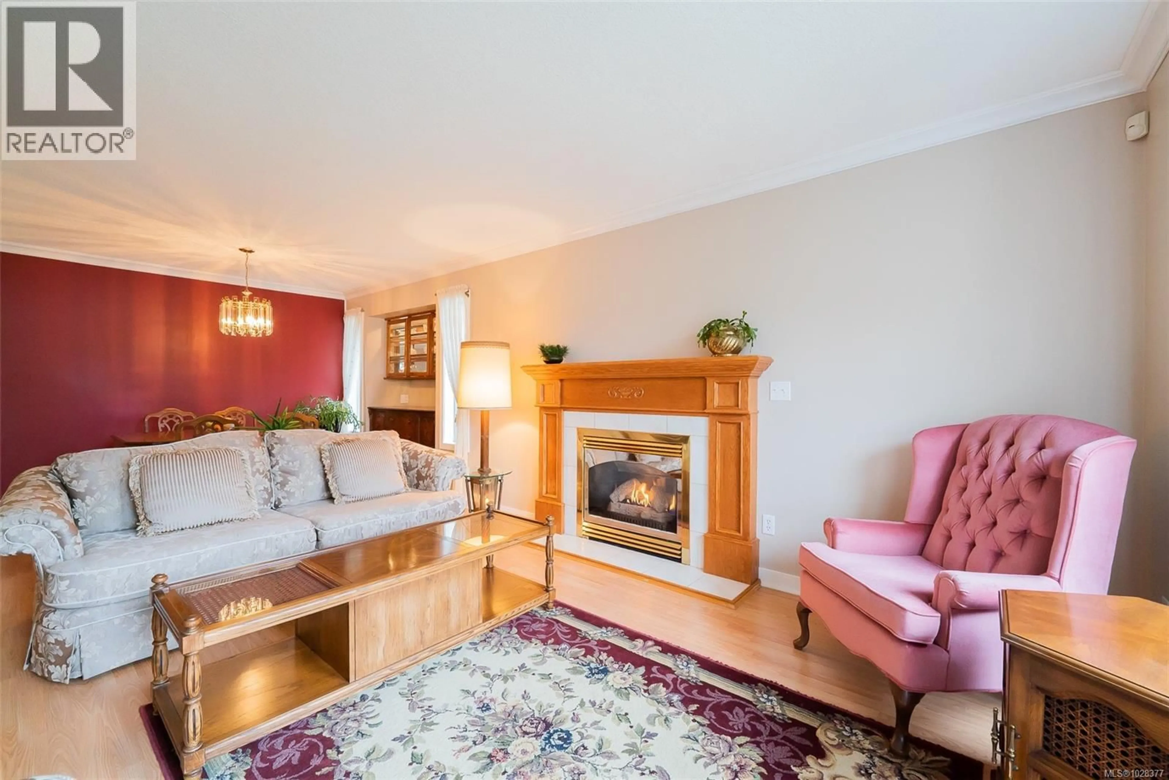 Living room with furniture, wood/laminate floor for 5962 MONASHEE WAY, Nanaimo British Columbia V9T6A2