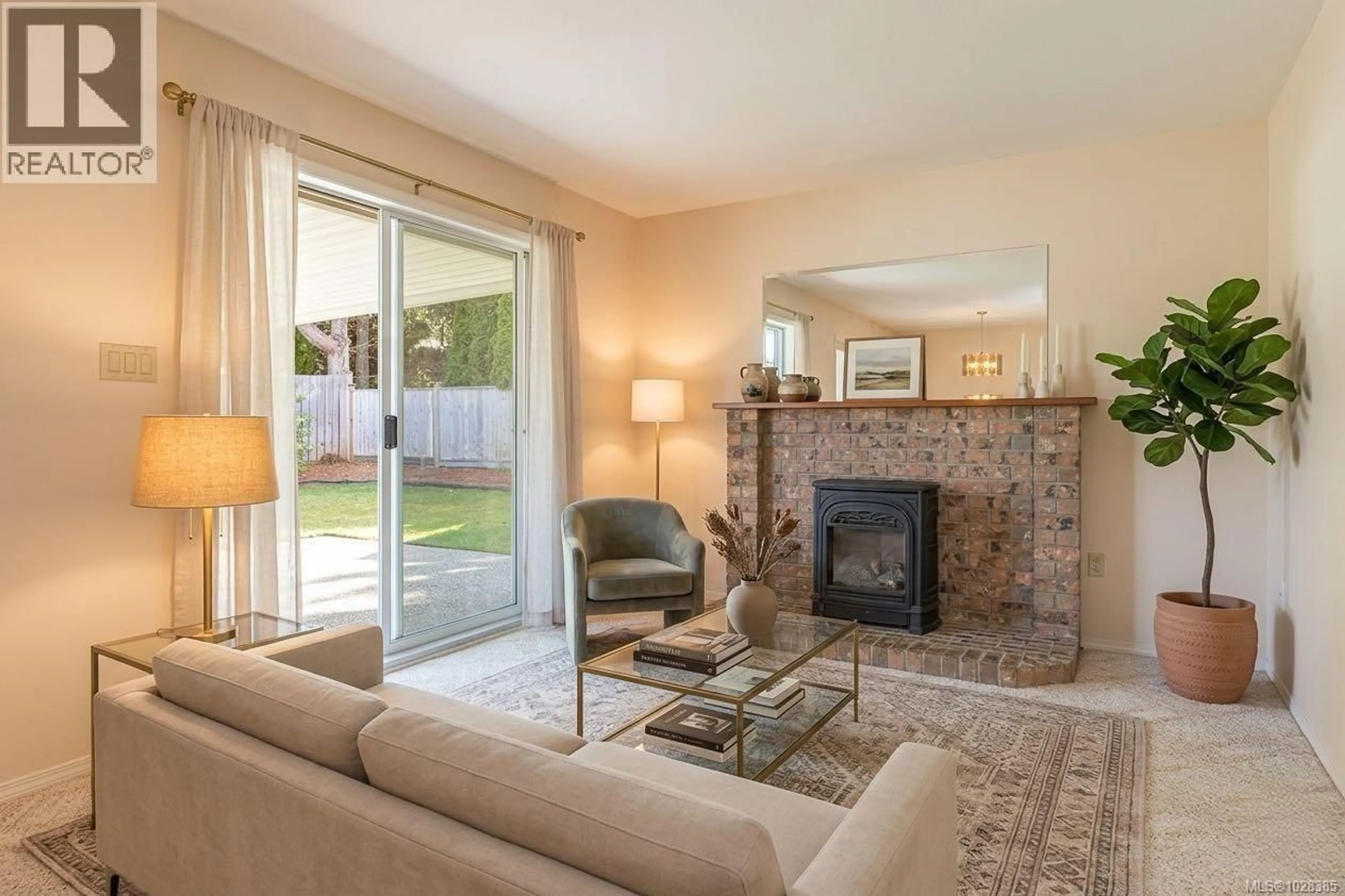 Living room with furniture, unknown for 700 ARBUTUS STREET, Qualicum Beach British Columbia V9K1K4