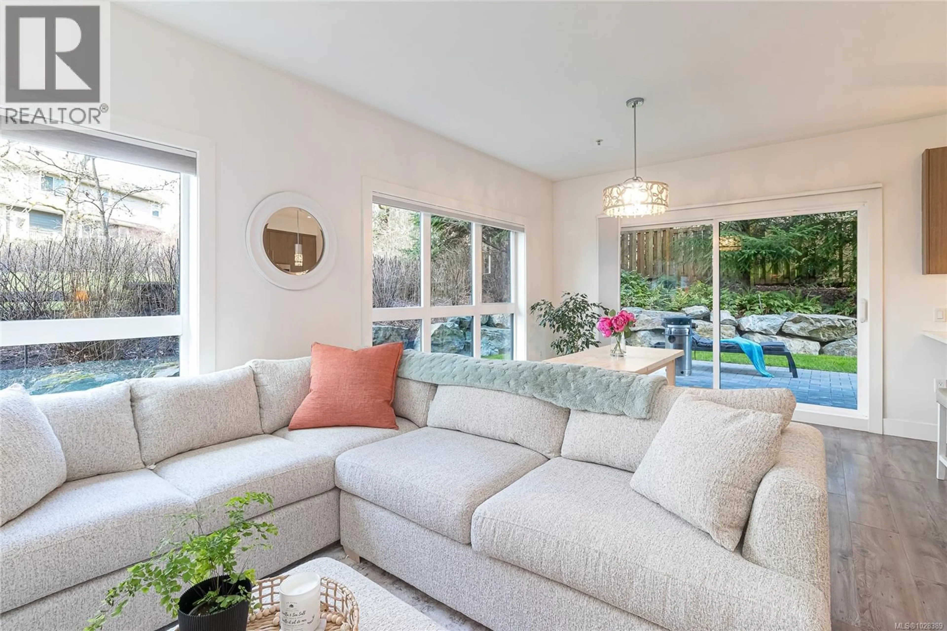 Living room with furniture, unknown for 105 - 740 TRAVINO LANE, Saanich British Columbia V8Z0E2