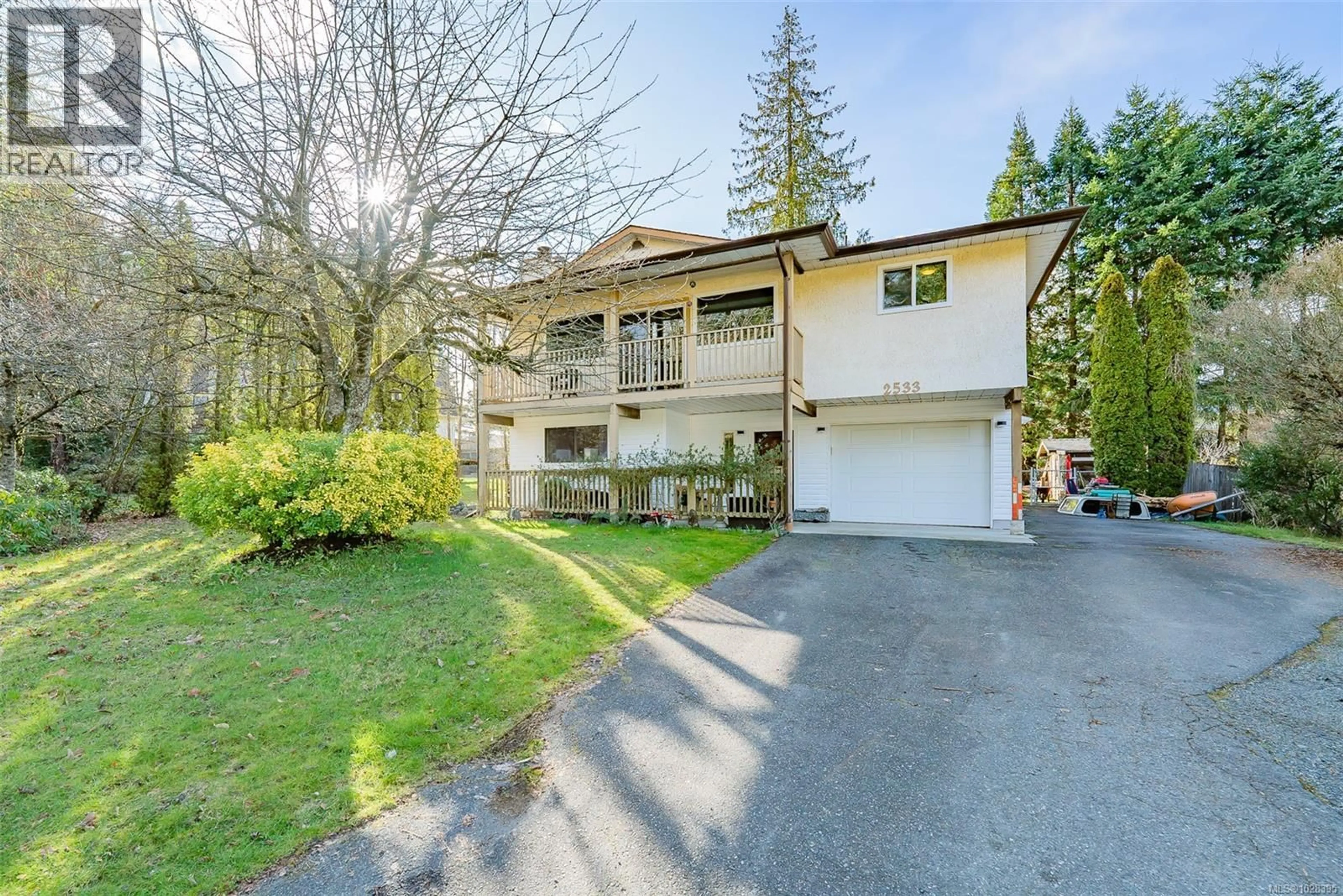 A pic from outside/outdoor area/front of a property/back of a property/a pic from drone, street for 2533 LABIEUX ROAD, Nanaimo British Columbia V9T3M8