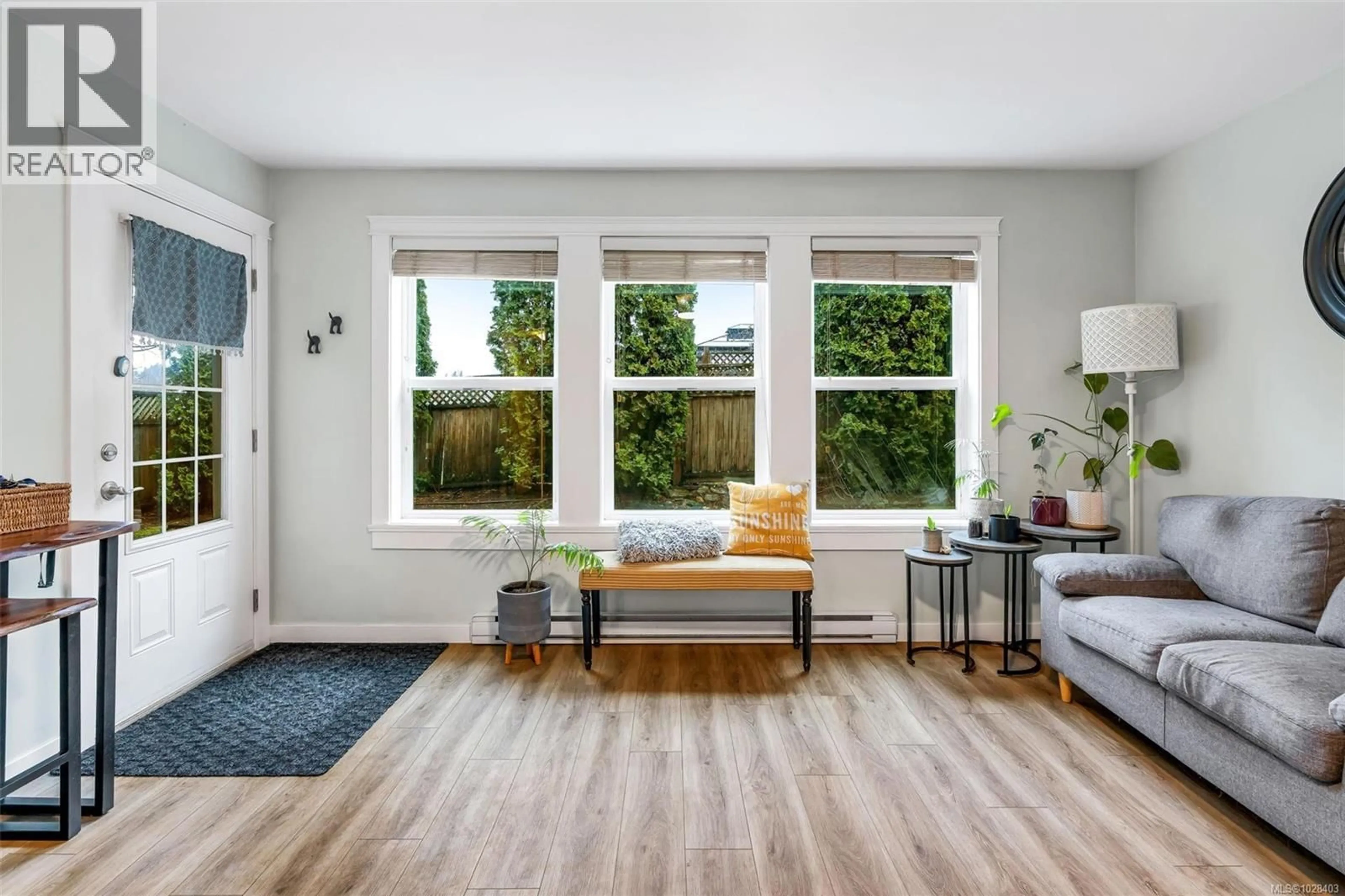 Living room with furniture, wood/laminate floor for 109 - 954 WALFRED ROAD, Langford British Columbia V9C0E2