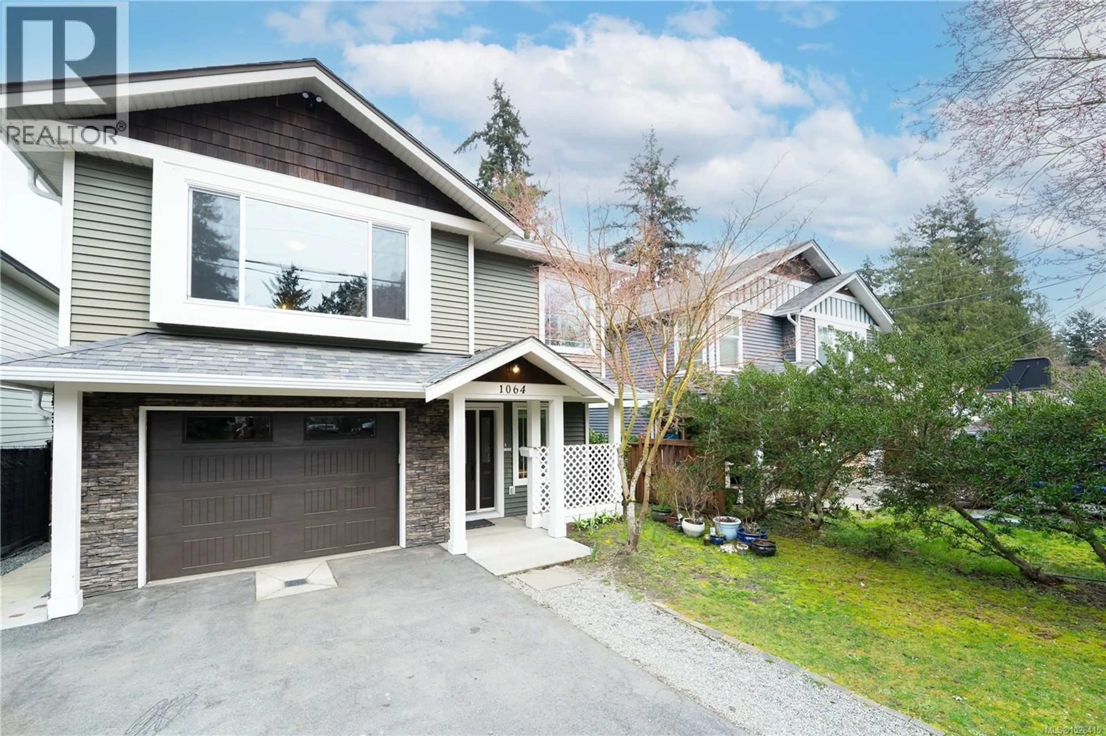 Home with vinyl exterior material, street for 1064 JENKINS AVENUE, Langford British Columbia V9B2N7