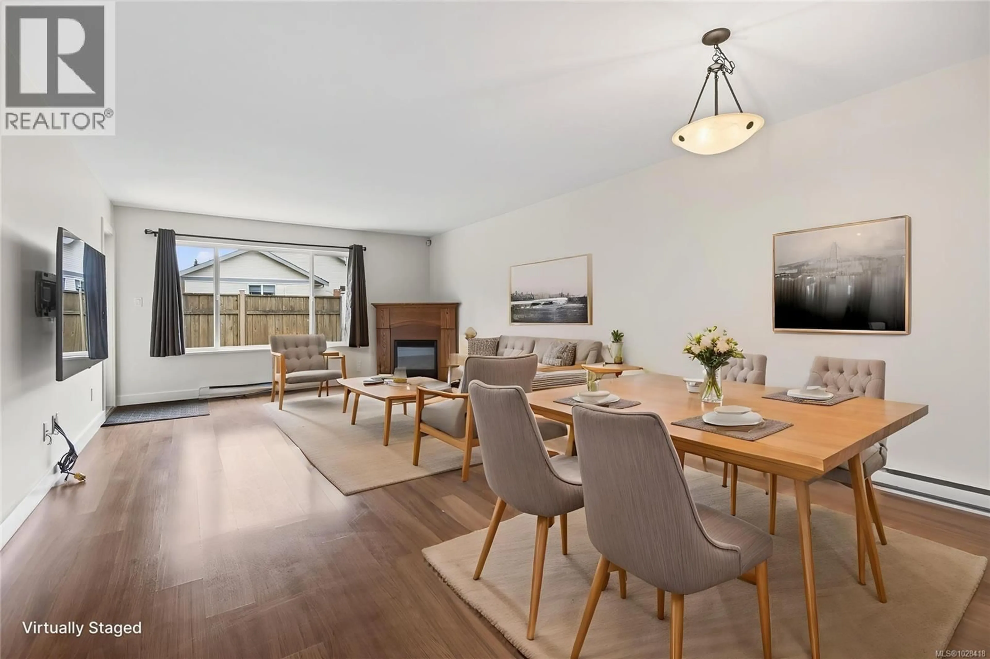 Dining room, wood/laminate floor for 8 - 3400 CONISTON CRESCENT, Cumberland British Columbia V0R1S0