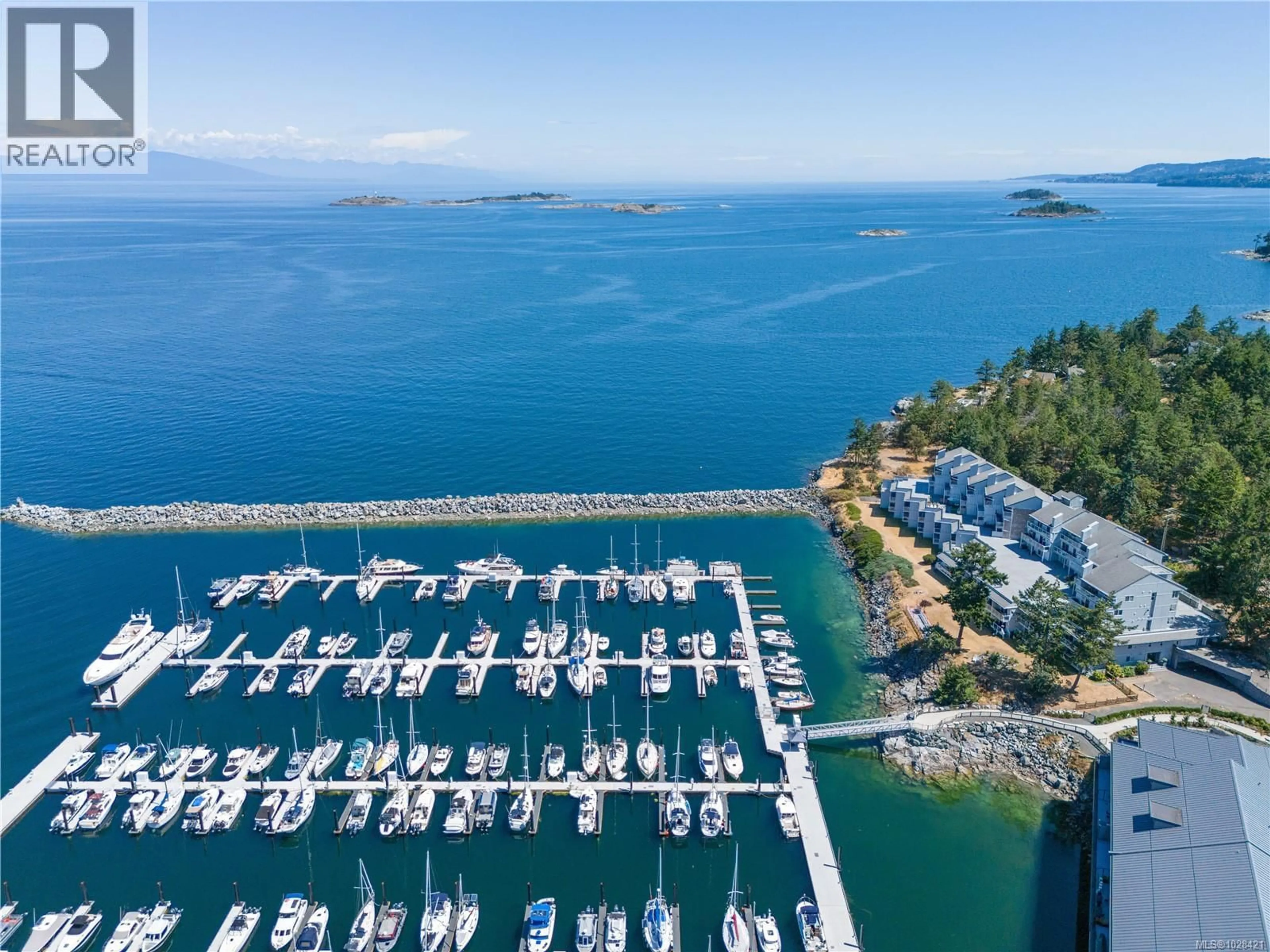 A pic from outside/outdoor area/front of a property/back of a property/a pic from drone, water/lake/river/ocean view for 302 - 3555 OUTRIGGER ROAD, Nanoose Bay British Columbia V9P9K1