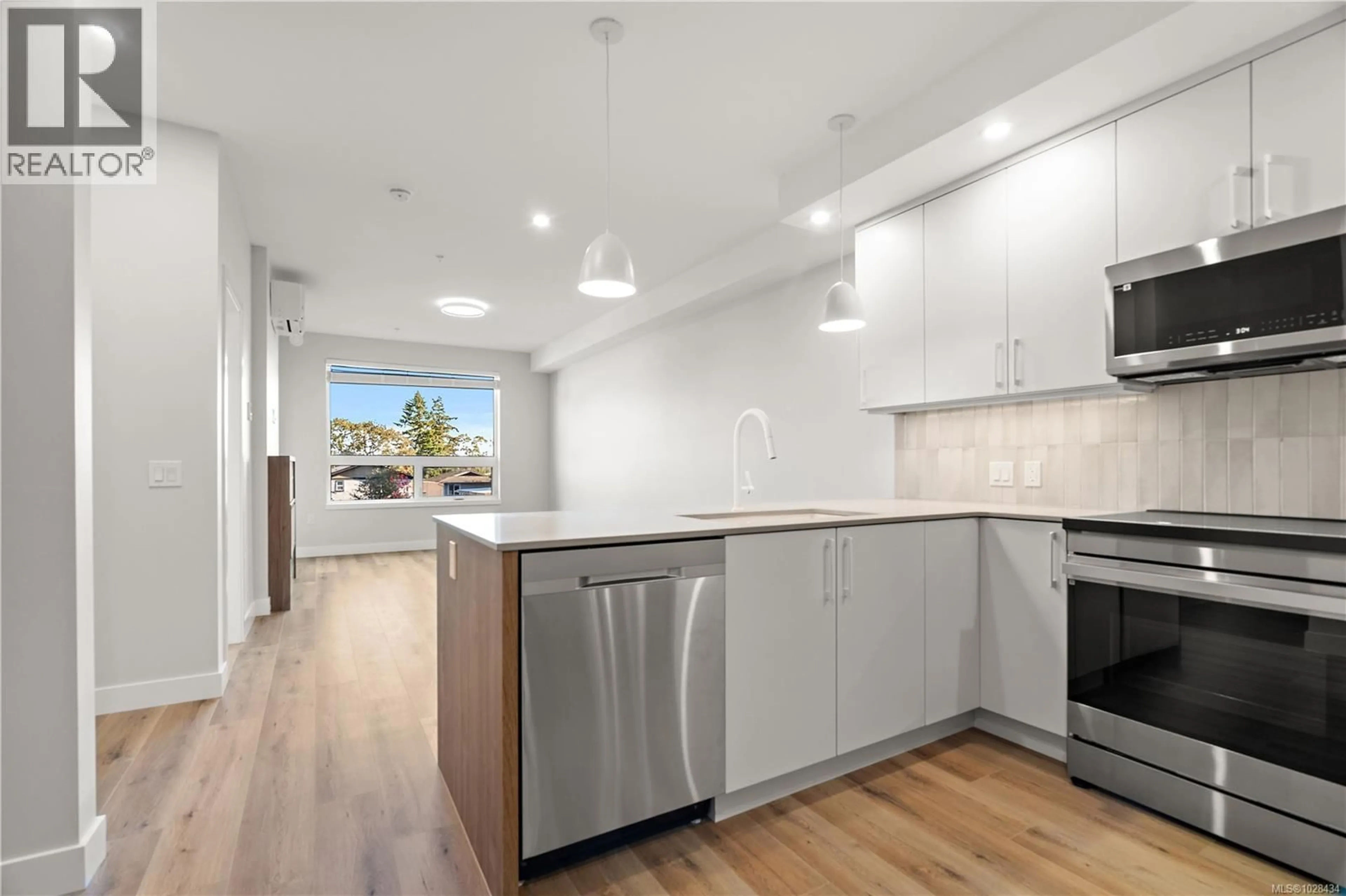 Open concept kitchen, unknown for 306 - 2881 LEIGH ROAD, Langford British Columbia V9B4G5