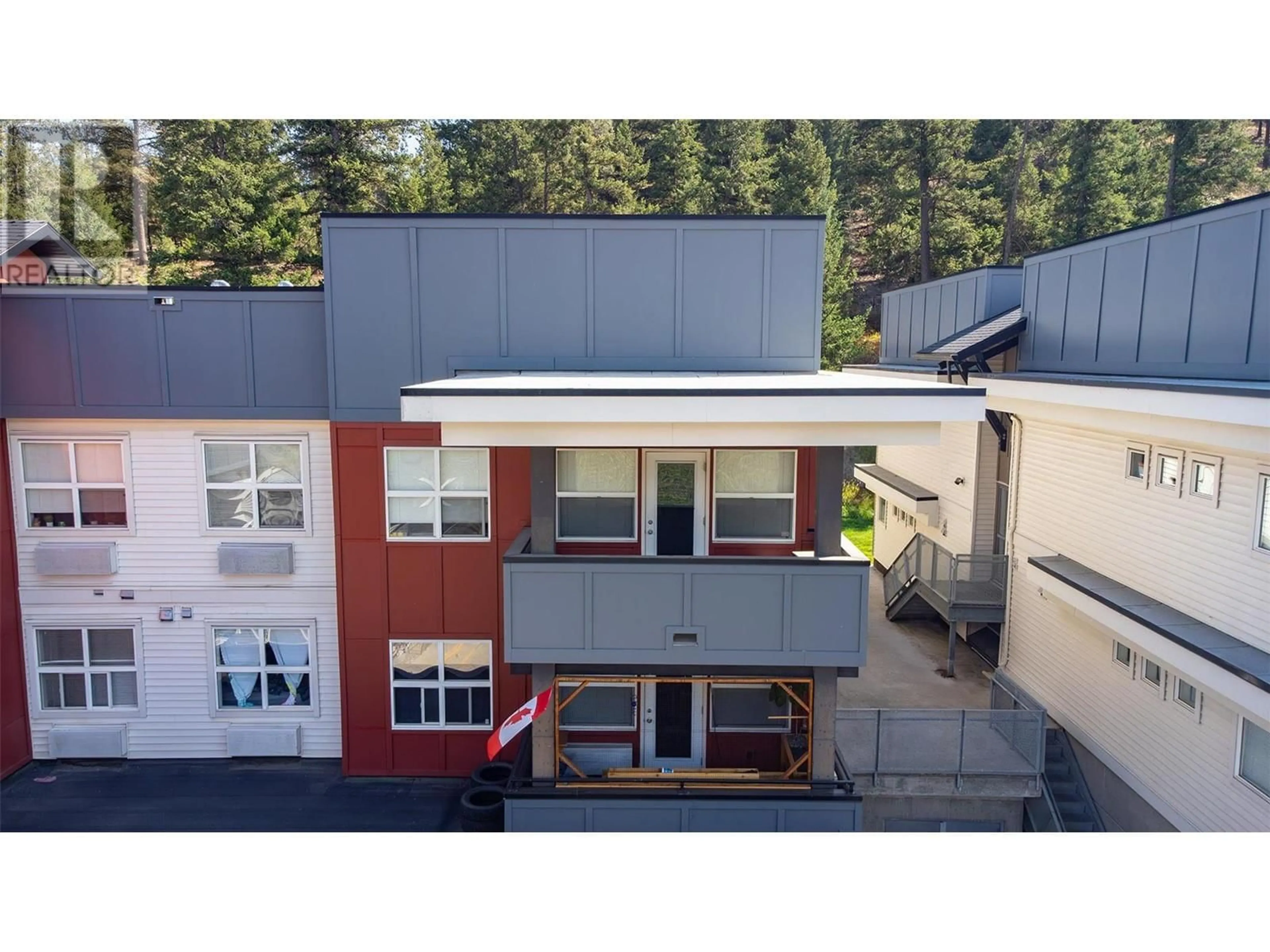 A pic from outside/outdoor area/front of a property/back of a property/a pic from drone, building for 301 - 1481 GLENMORE ROAD NORTH, Kelowna British Columbia V1V2C5