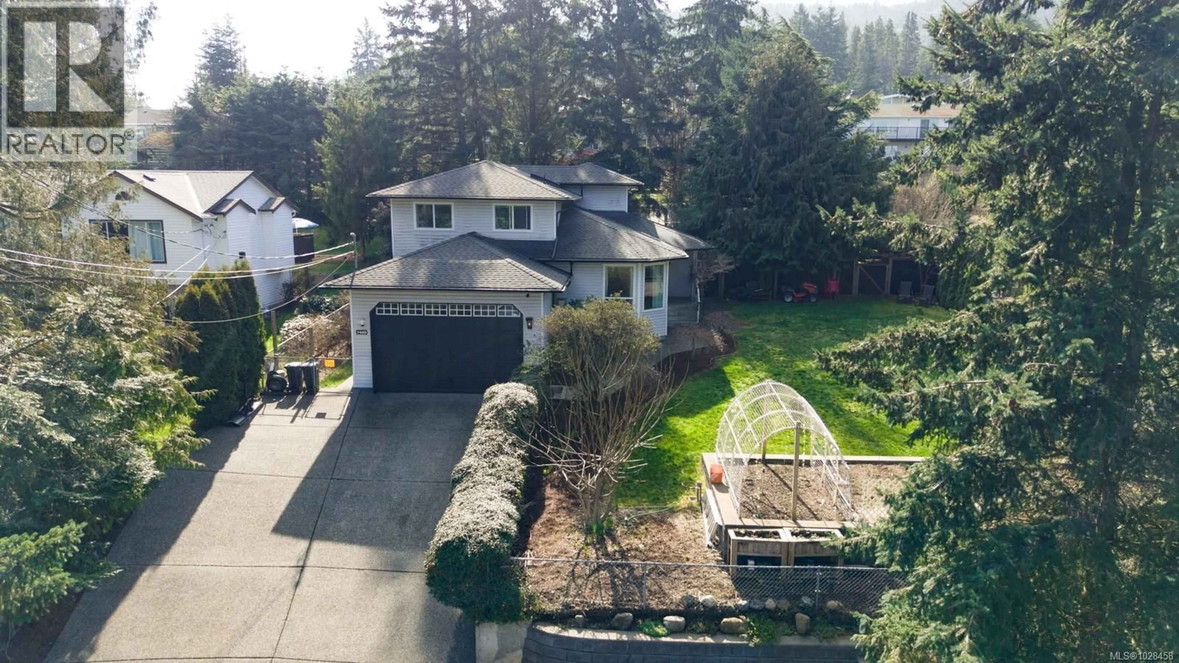 A pic from outside/outdoor area/front of a property/back of a property/a pic from drone, street for 7465 FERNMAR ROAD, Lantzville British Columbia V0R2H0
